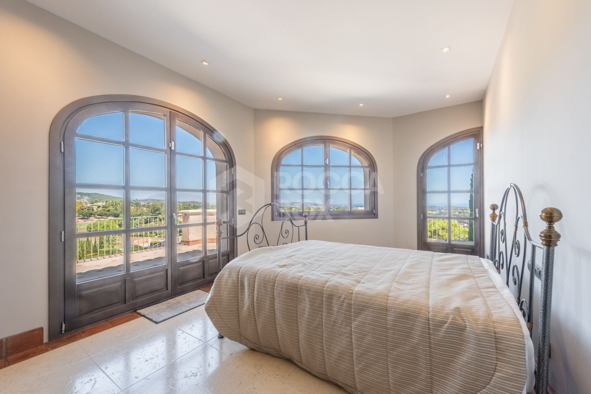 A superb villa built on an elevated site with outstanding panoramic views over golf courses to mountains and the sea.