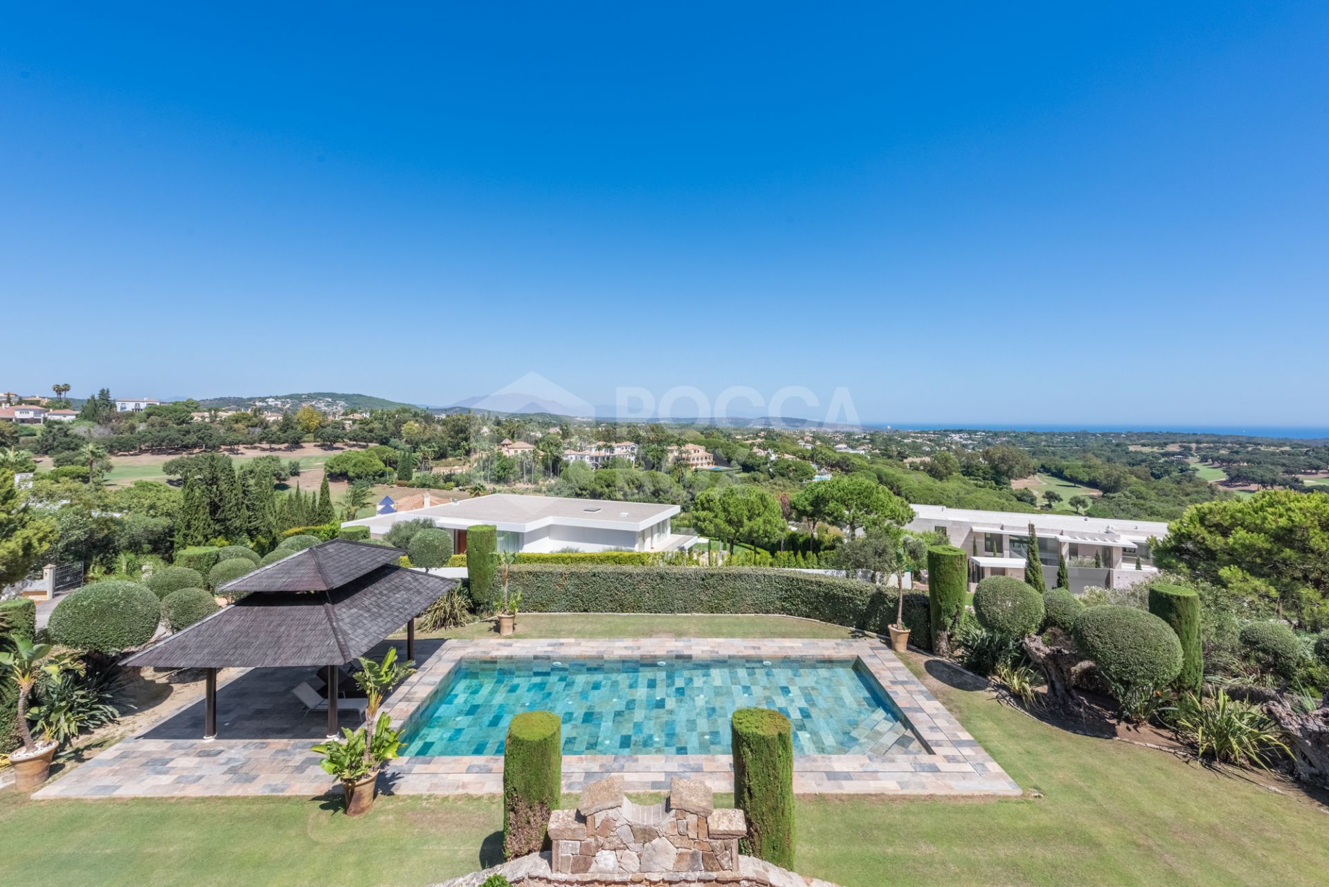 A superb villa built on an elevated site with outstanding panoramic views over golf courses to mountains and the sea.