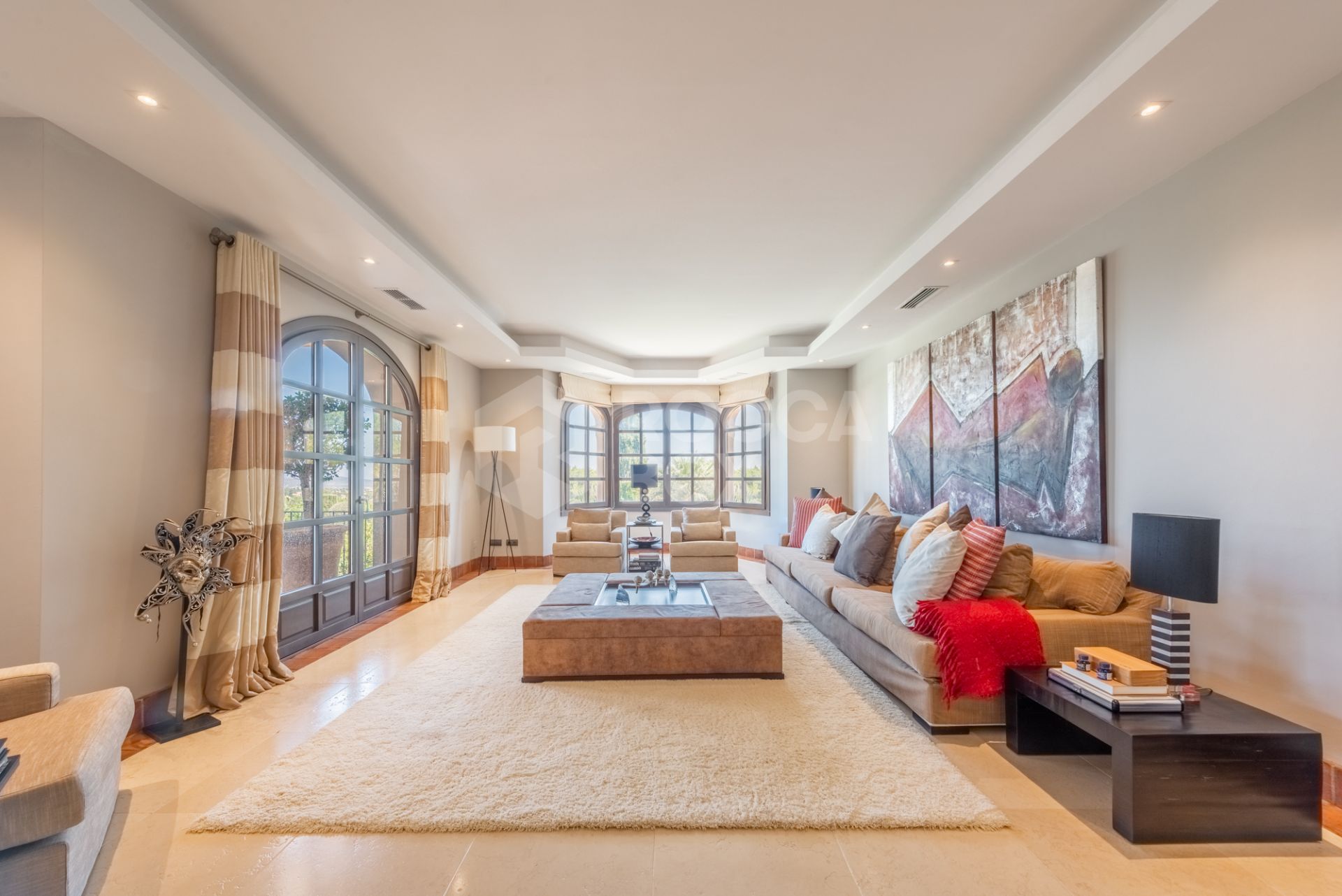 A superb villa built on an elevated site with outstanding panoramic views over golf courses to mountains and the sea.