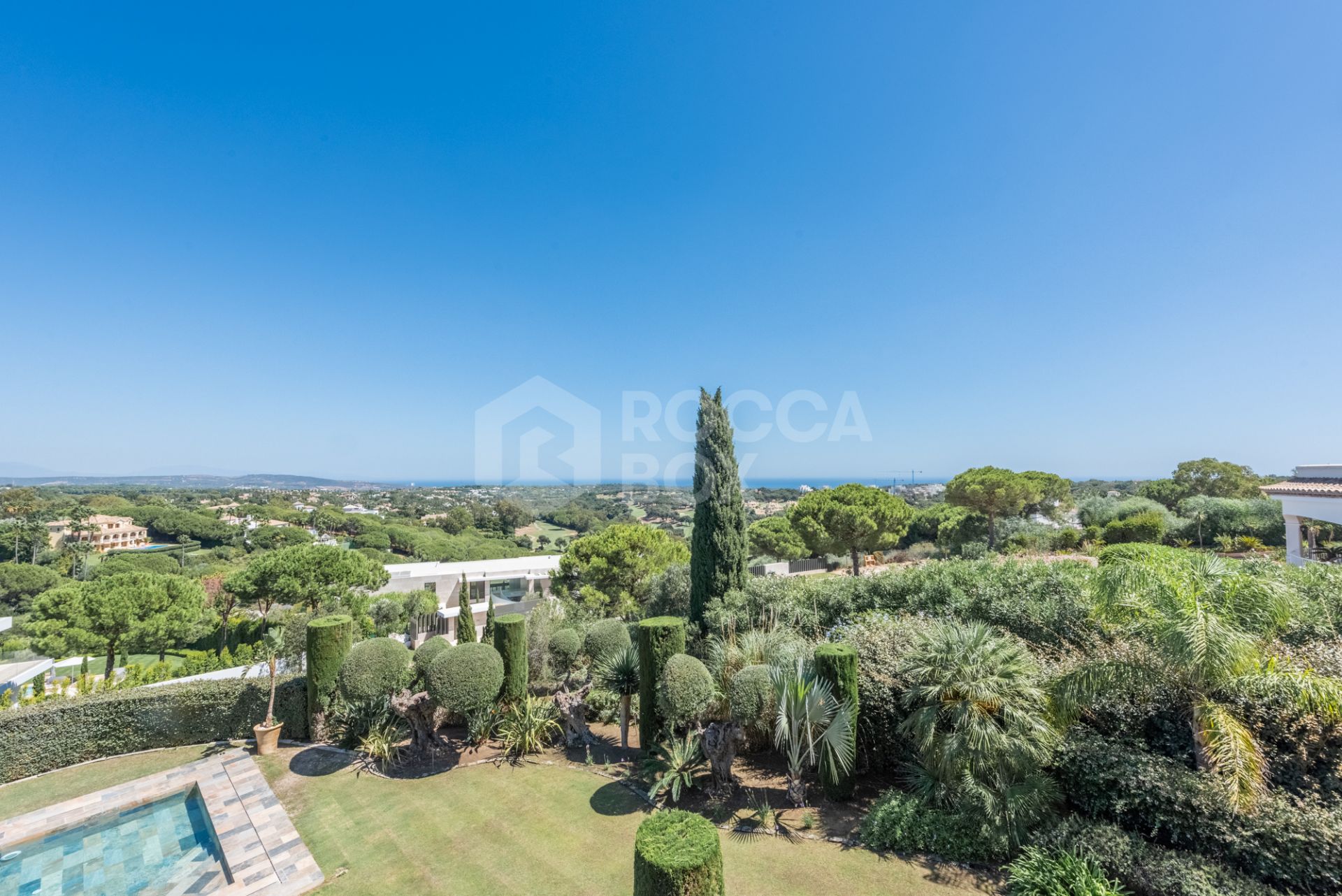 A superb villa built on an elevated site with outstanding panoramic views over golf courses to mountains and the sea.