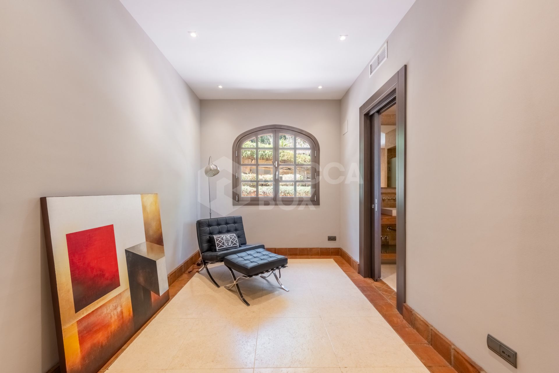 A superb villa built on an elevated site with outstanding panoramic views over golf courses to mountains and the sea.