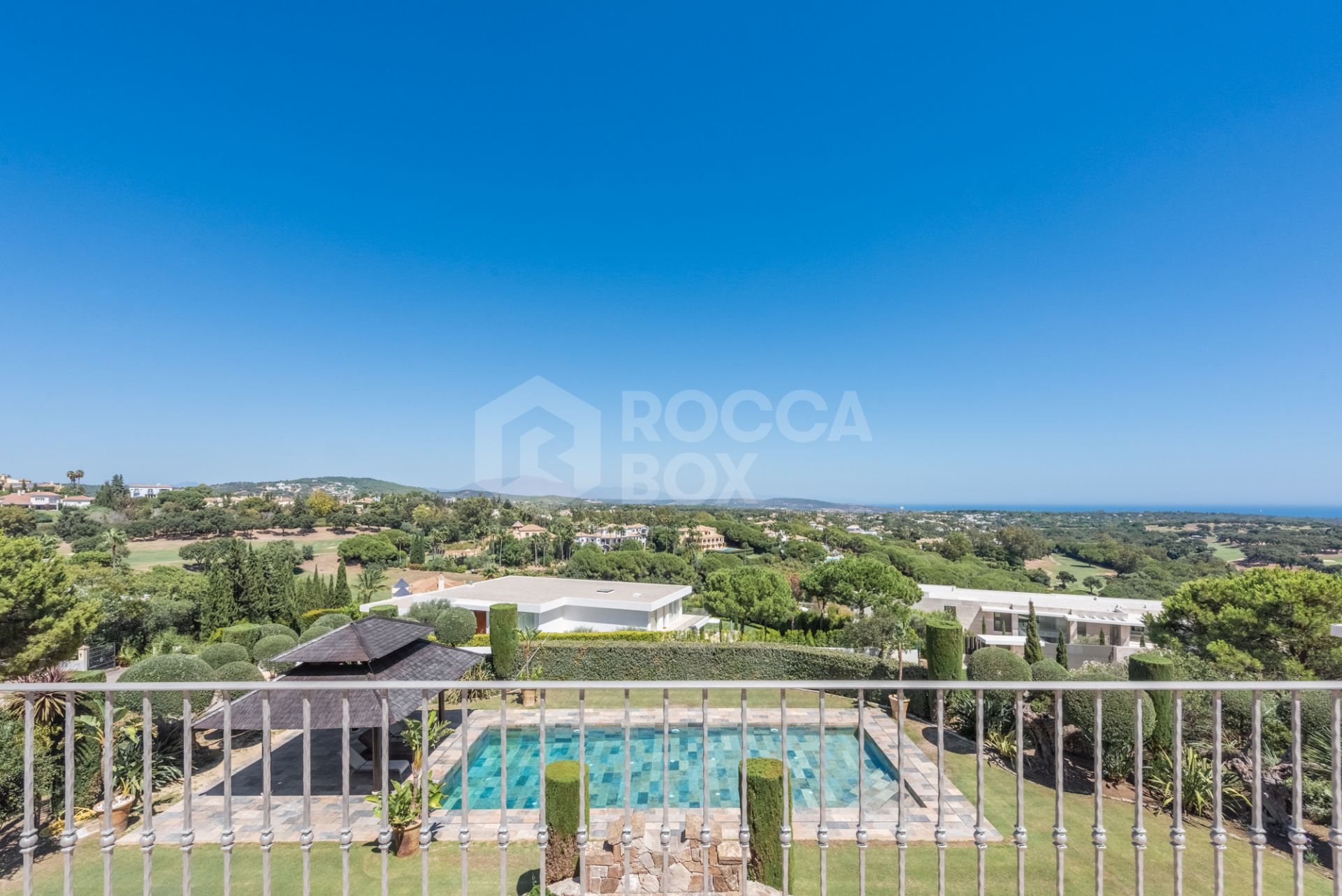 A superb villa built on an elevated site with outstanding panoramic views over golf courses to mountains and the sea.