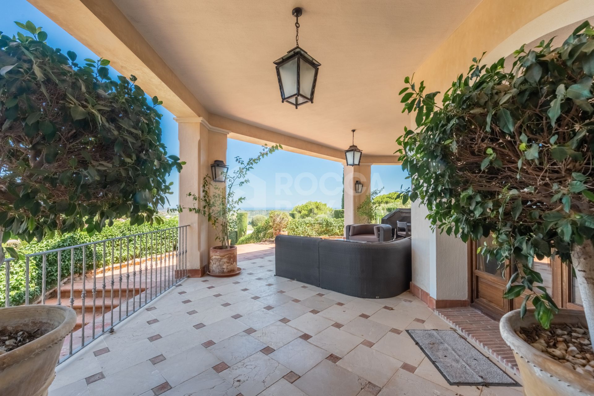 A superb villa built on an elevated site with outstanding panoramic views over golf courses to mountains and the sea.