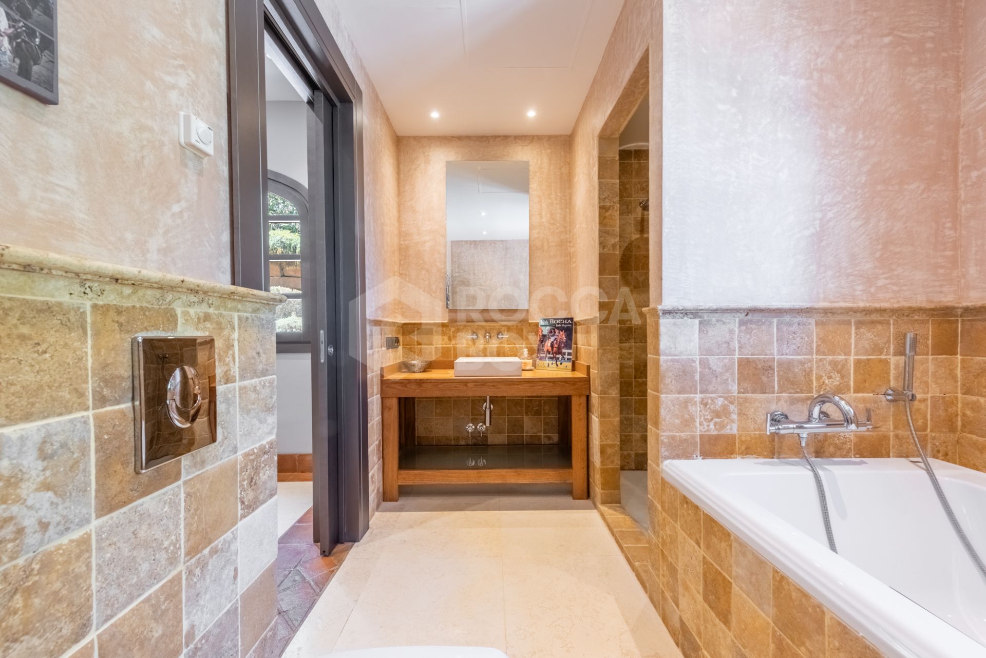 A superb villa built on an elevated site with outstanding panoramic views over golf courses to mountains and the sea.