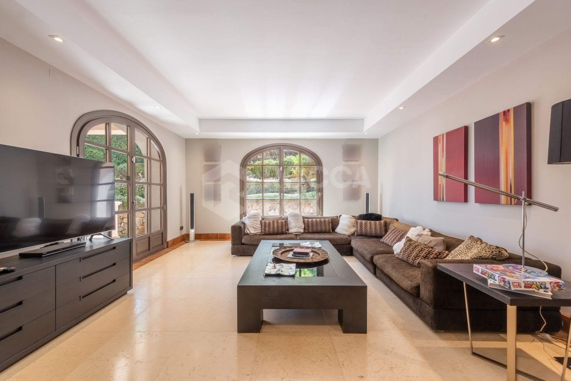 A superb villa built on an elevated site with outstanding panoramic views over golf courses to mountains and the sea.