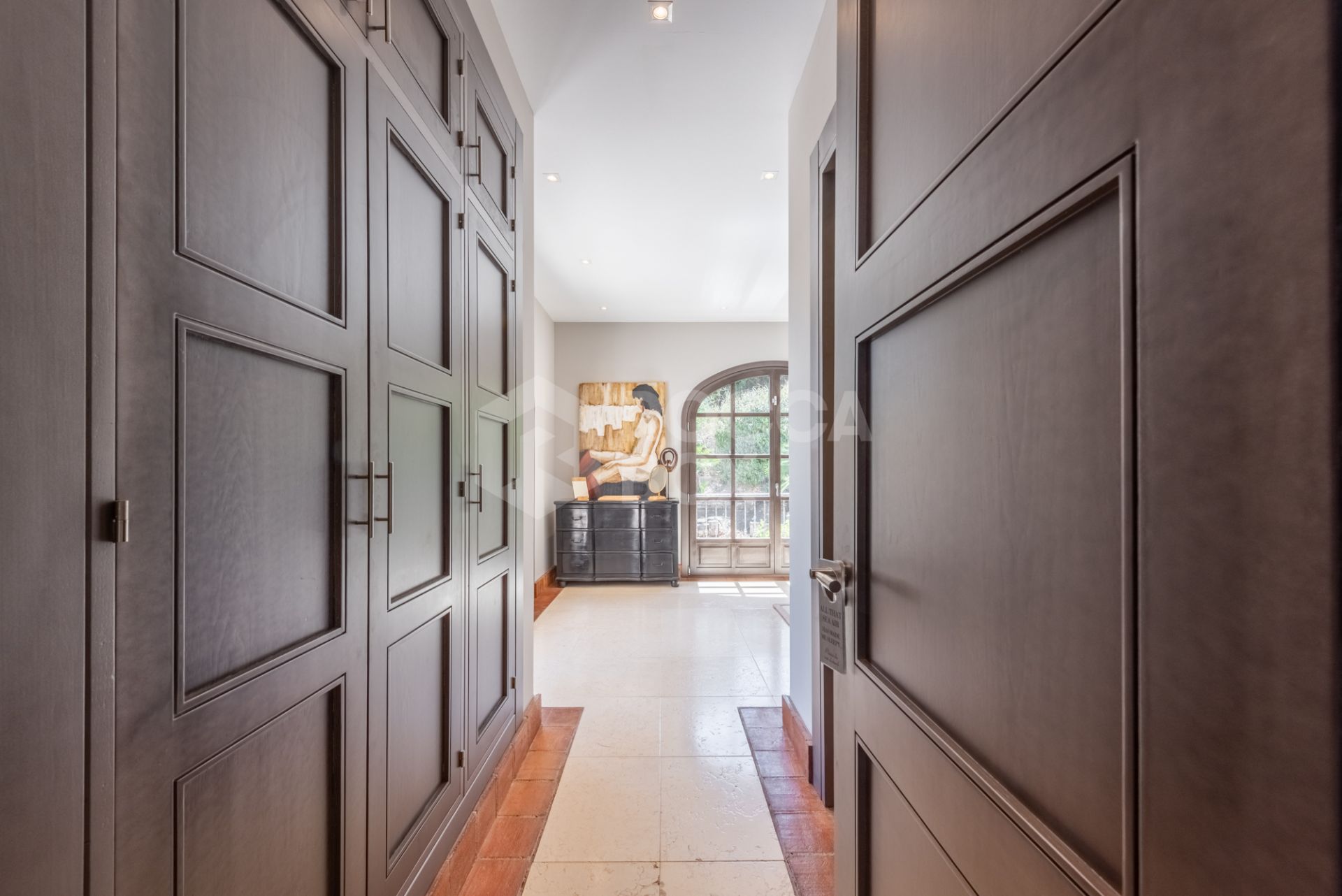 A superb villa built on an elevated site with outstanding panoramic views over golf courses to mountains and the sea.