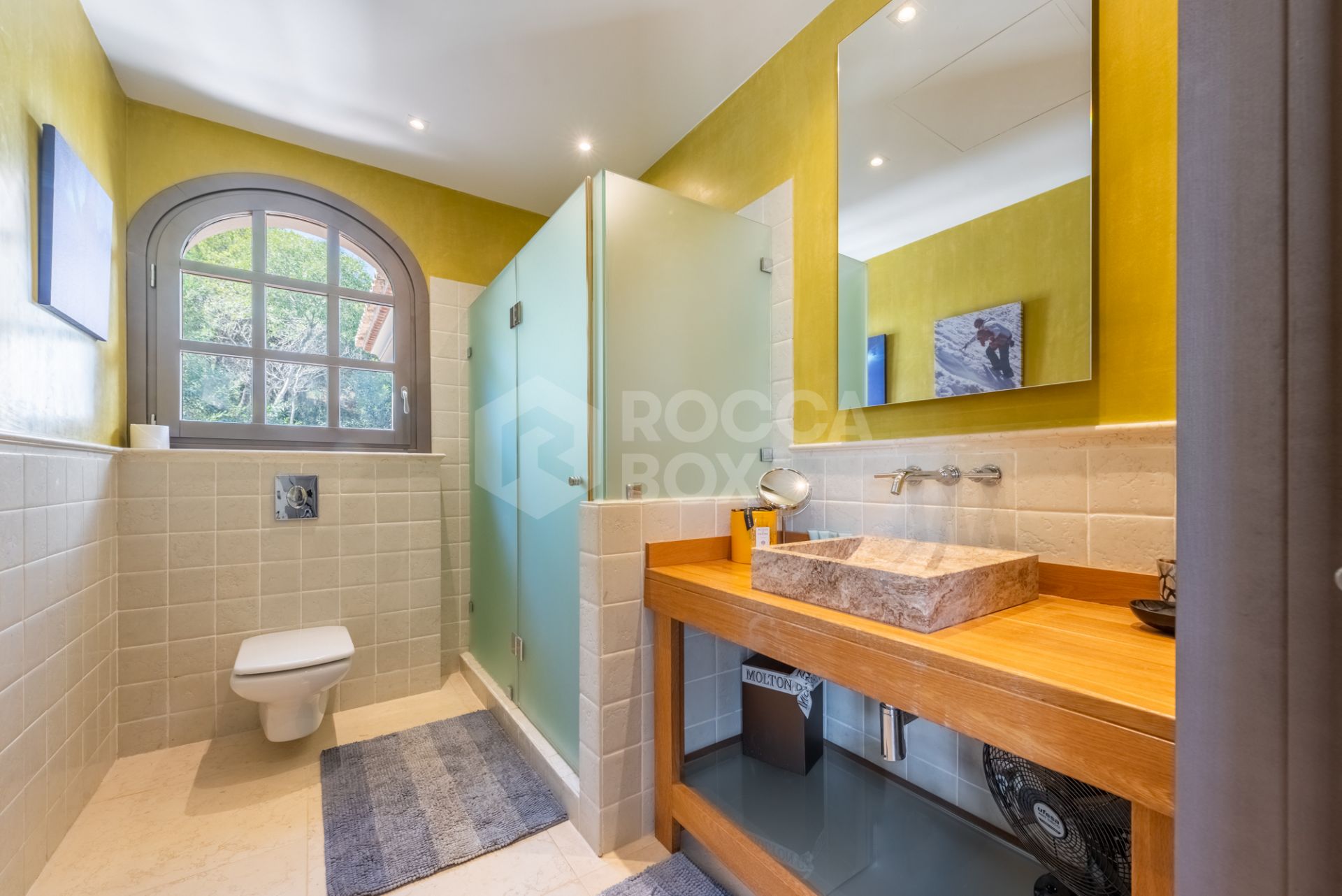 A superb villa built on an elevated site with outstanding panoramic views over golf courses to mountains and the sea.