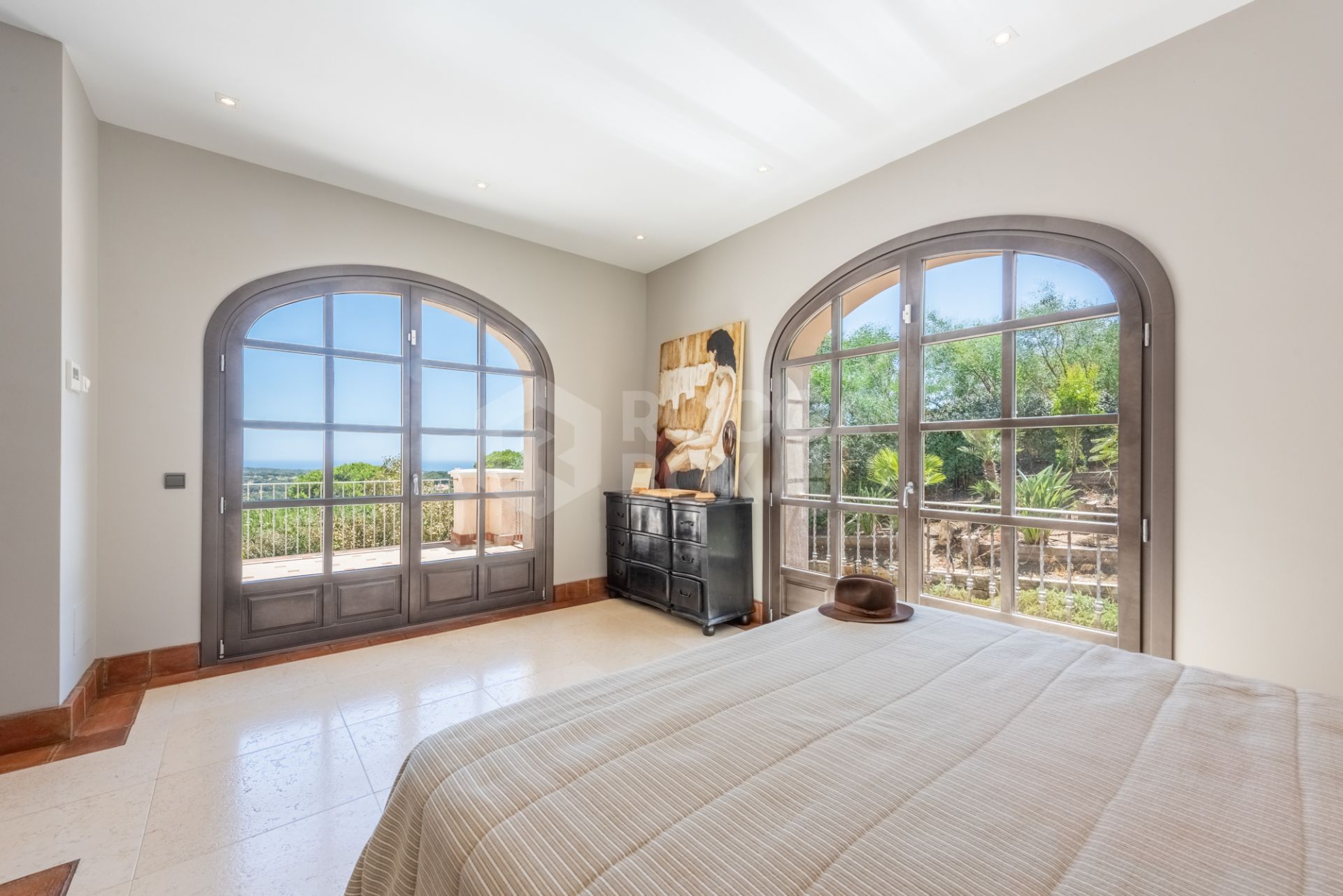 A superb villa built on an elevated site with outstanding panoramic views over golf courses to mountains and the sea.