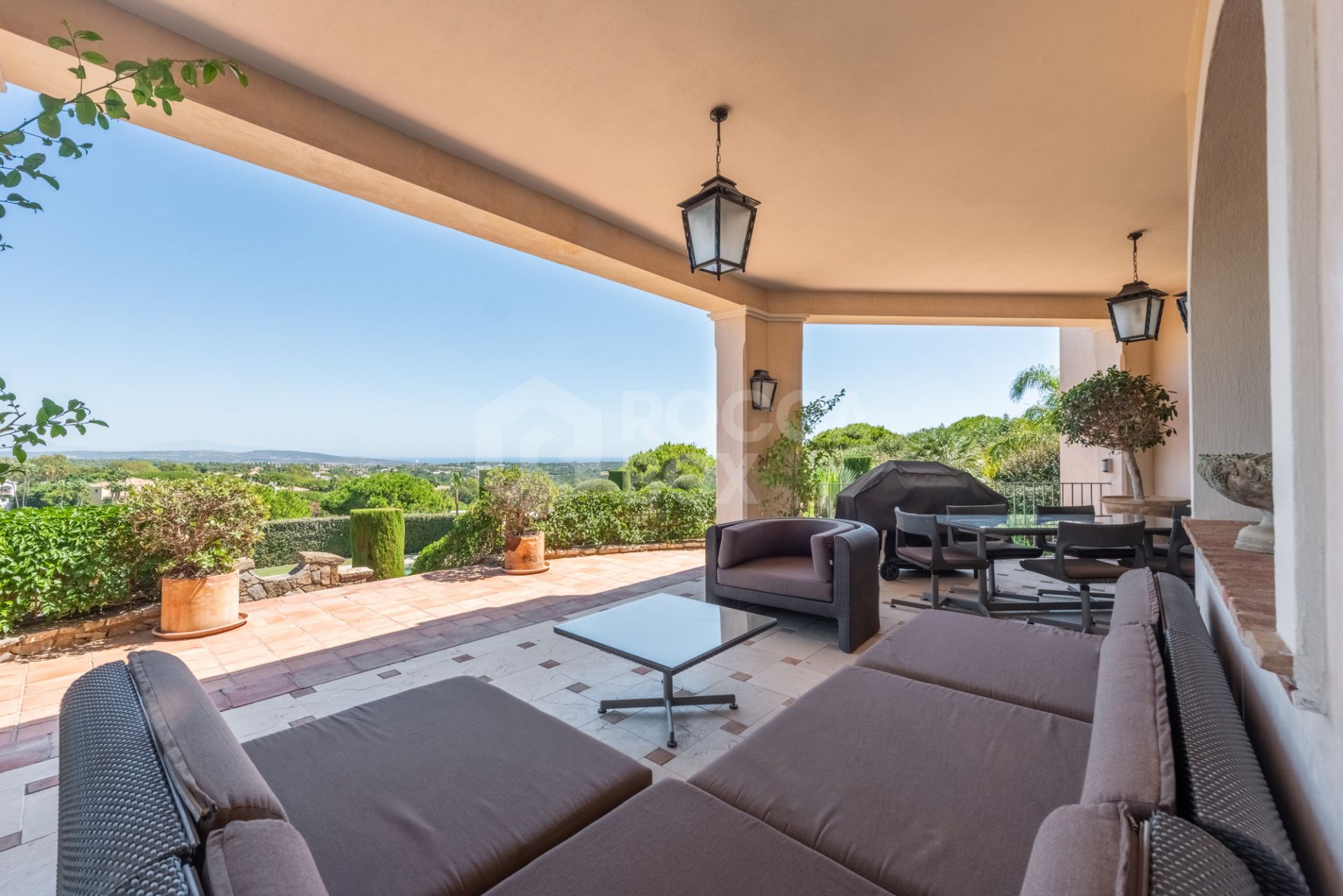 A superb villa built on an elevated site with outstanding panoramic views over golf courses to mountains and the sea.