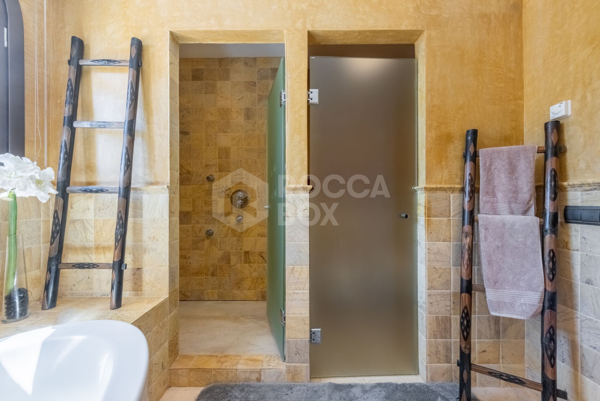 A superb villa built on an elevated site with outstanding panoramic views over golf courses to mountains and the sea.