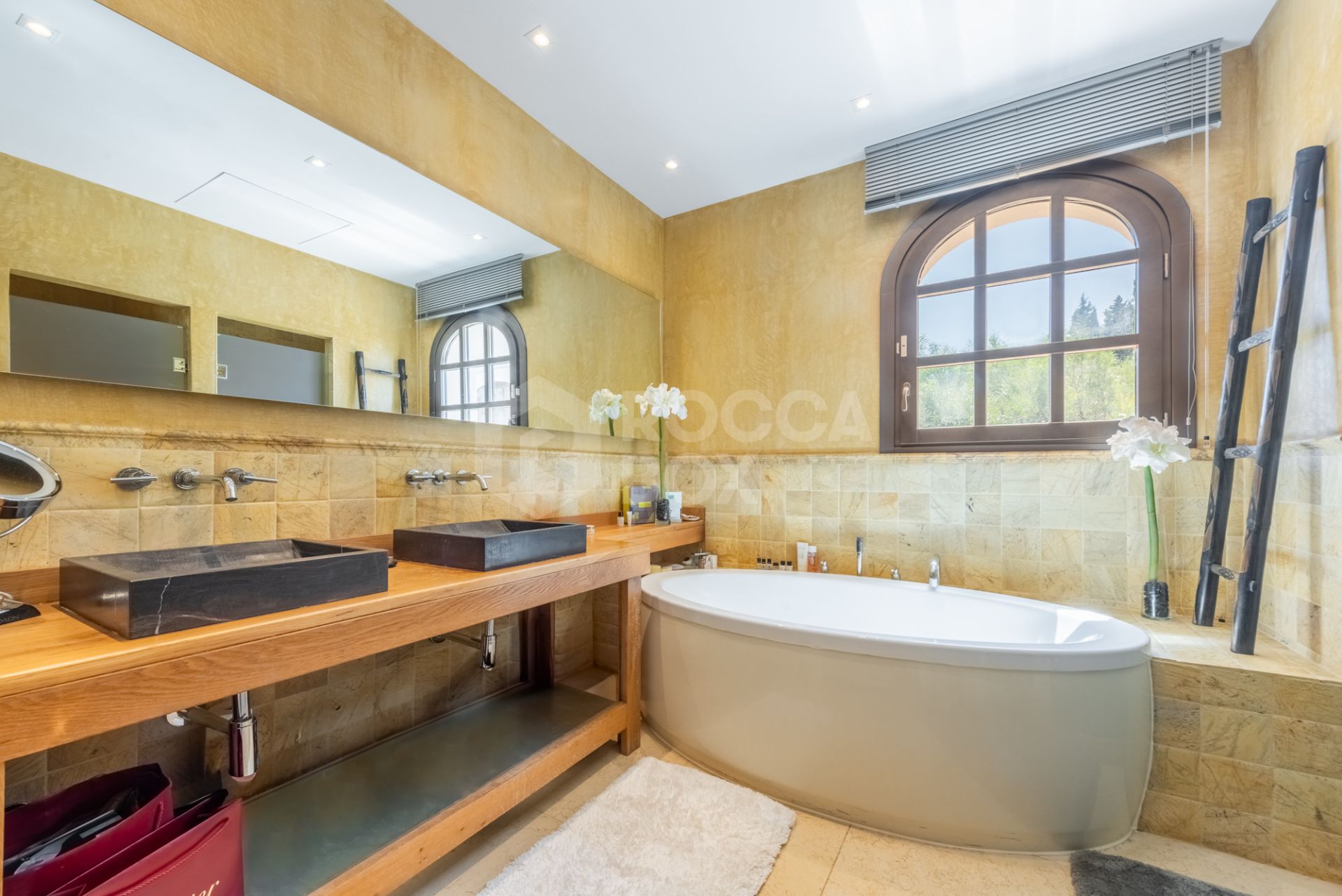 A superb villa built on an elevated site with outstanding panoramic views over golf courses to mountains and the sea.