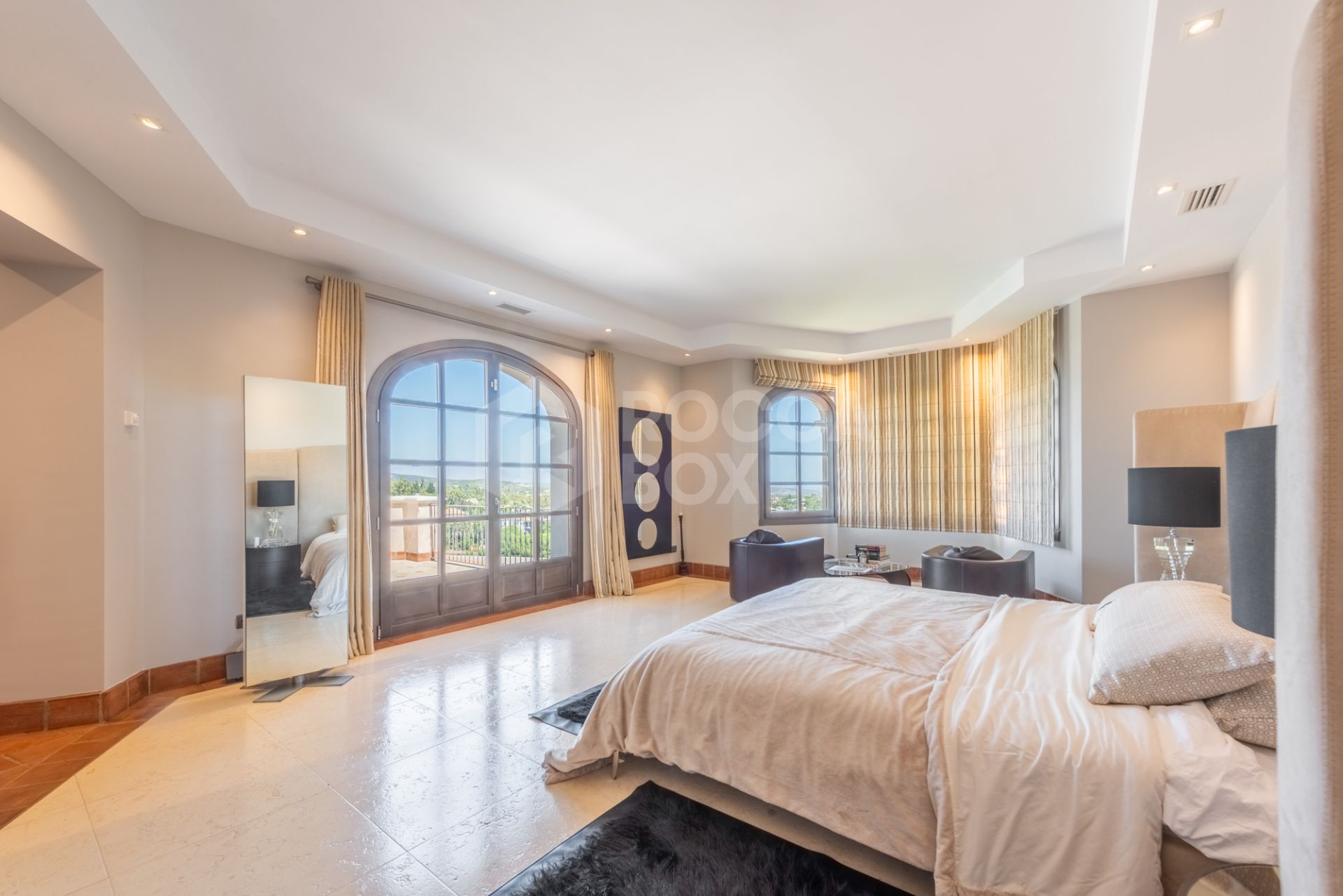 A superb villa built on an elevated site with outstanding panoramic views over golf courses to mountains and the sea.