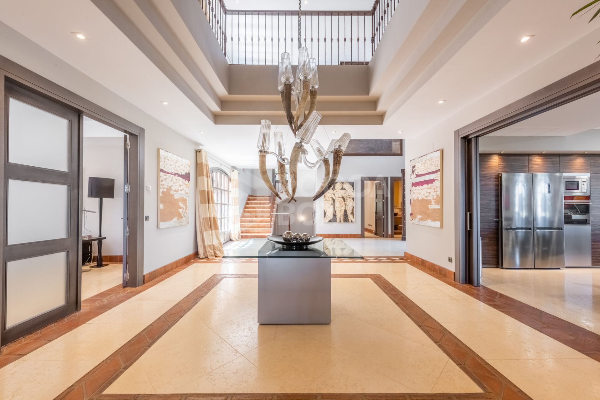 A superb villa built on an elevated site with outstanding panoramic views over golf courses to mountains and the sea.