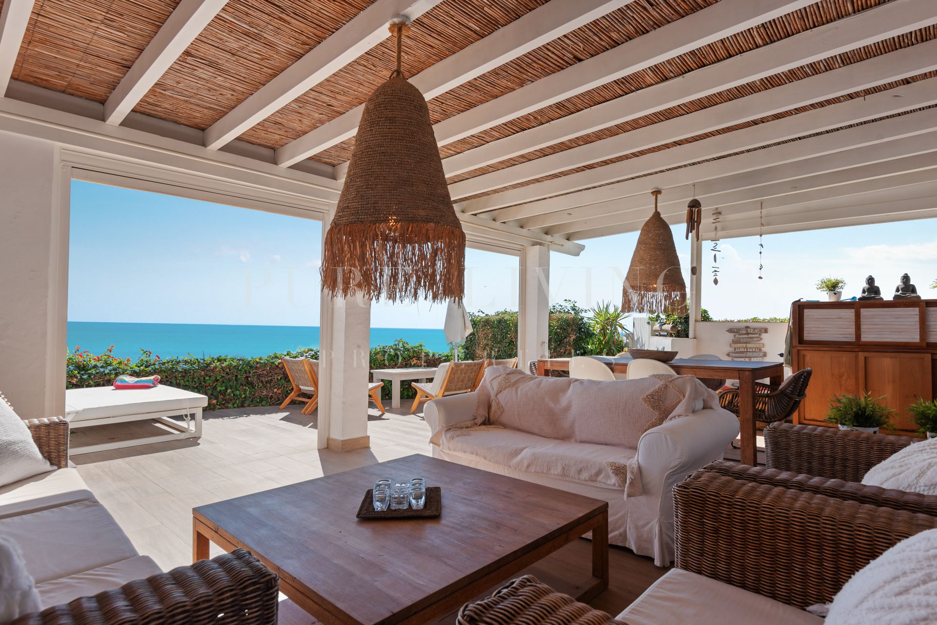Serene frontline beach townhouse for sale with panoramic views in Bahia Azul in Estepona West