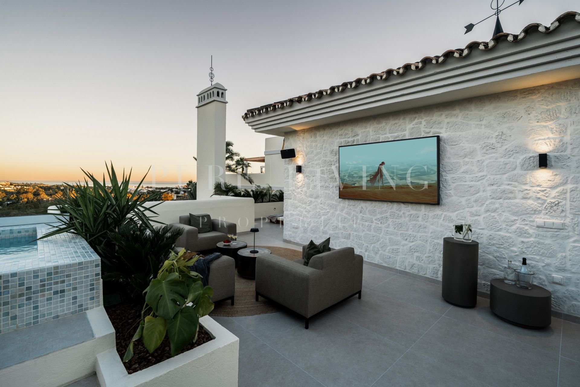 Outstanding duplex penthouse featuring an amazing rooftop terrace with sea and mountain views