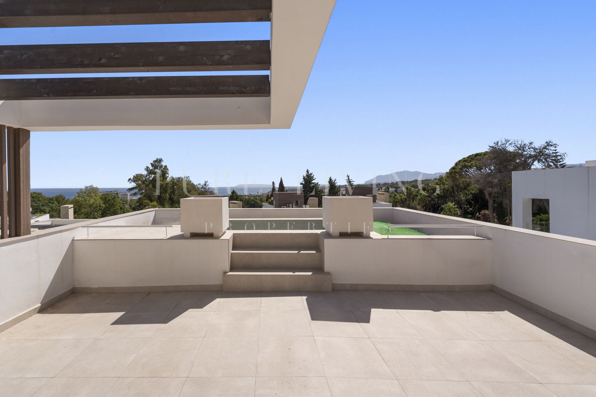 A modern four bedroom villa is nestled within a luxury gated community in Marbella.