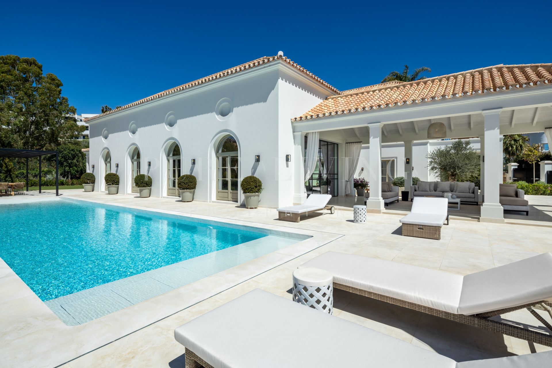 An exquisite classical estate nestled within the prestigious Nueva Andalucia.