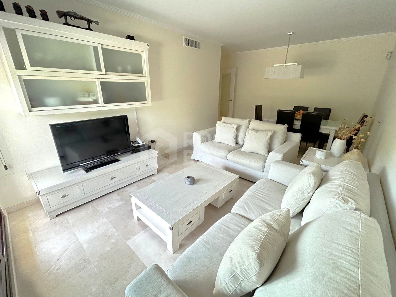 EXCLUSIVE - Three bedroom apartment for sale in the popular Sethome community in Estepona Town.