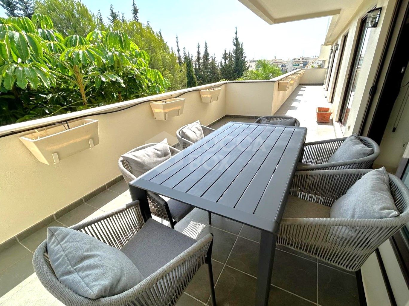 EXCLUSIVE - Three bedroom apartment for sale in the popular Sethome community in Estepona Town.