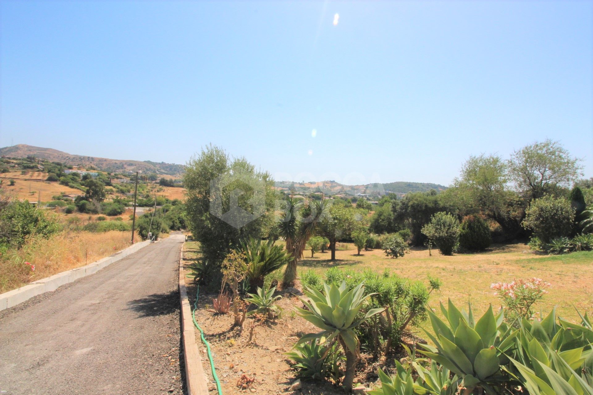 Large private villa with pool and extensive plot for sale in Estepona