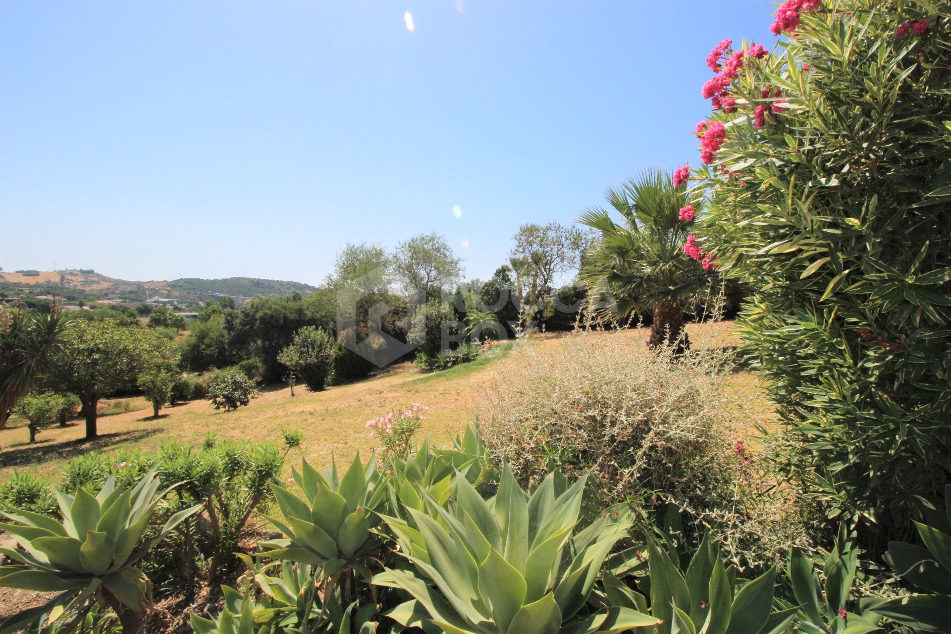 Large private villa with pool and extensive plot for sale in Estepona