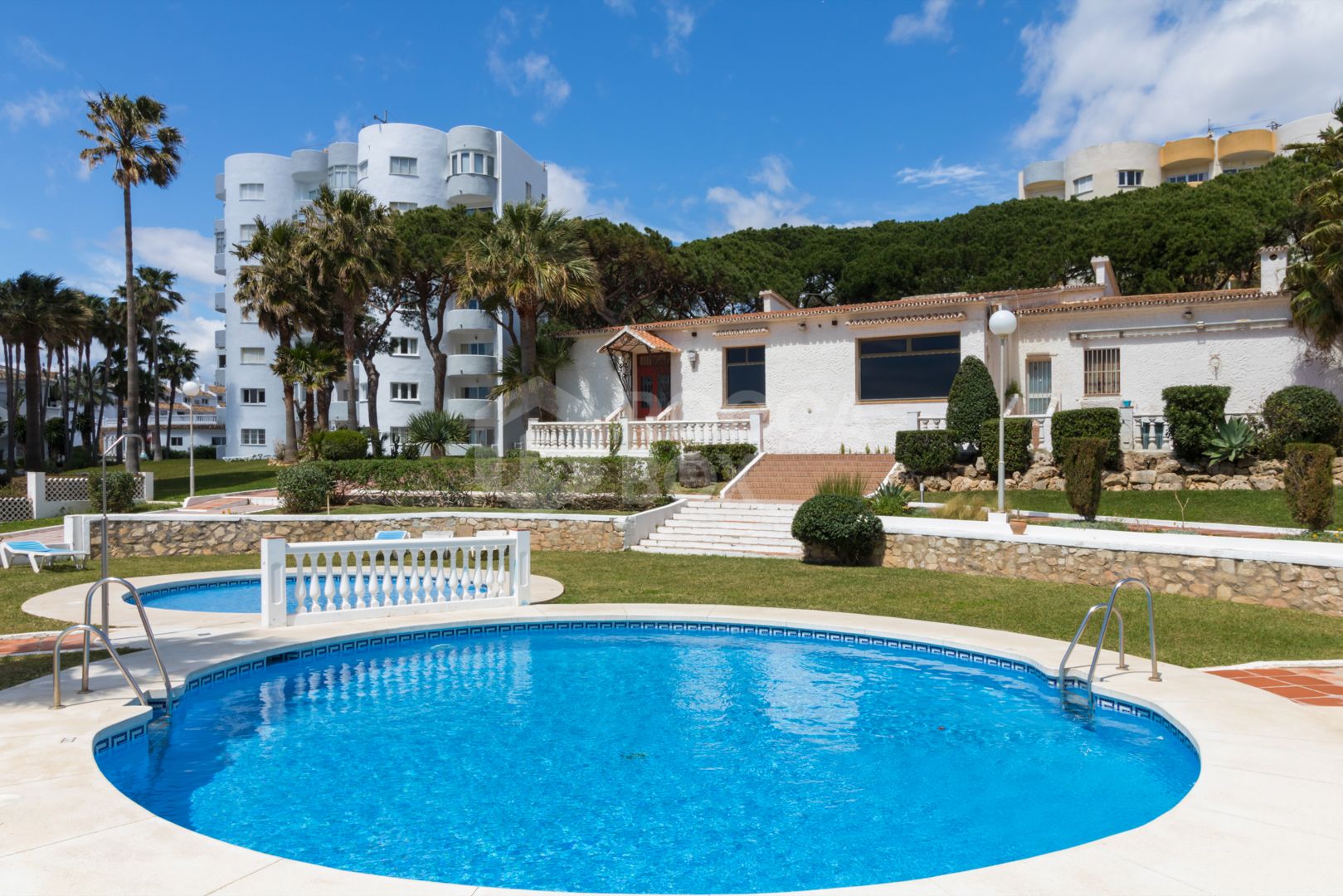 This exclusive 4th-floor apartment is a true coastal sanctuary, offering uninterrupted sea views and direct access to pristine beaches and lush communal gardens.