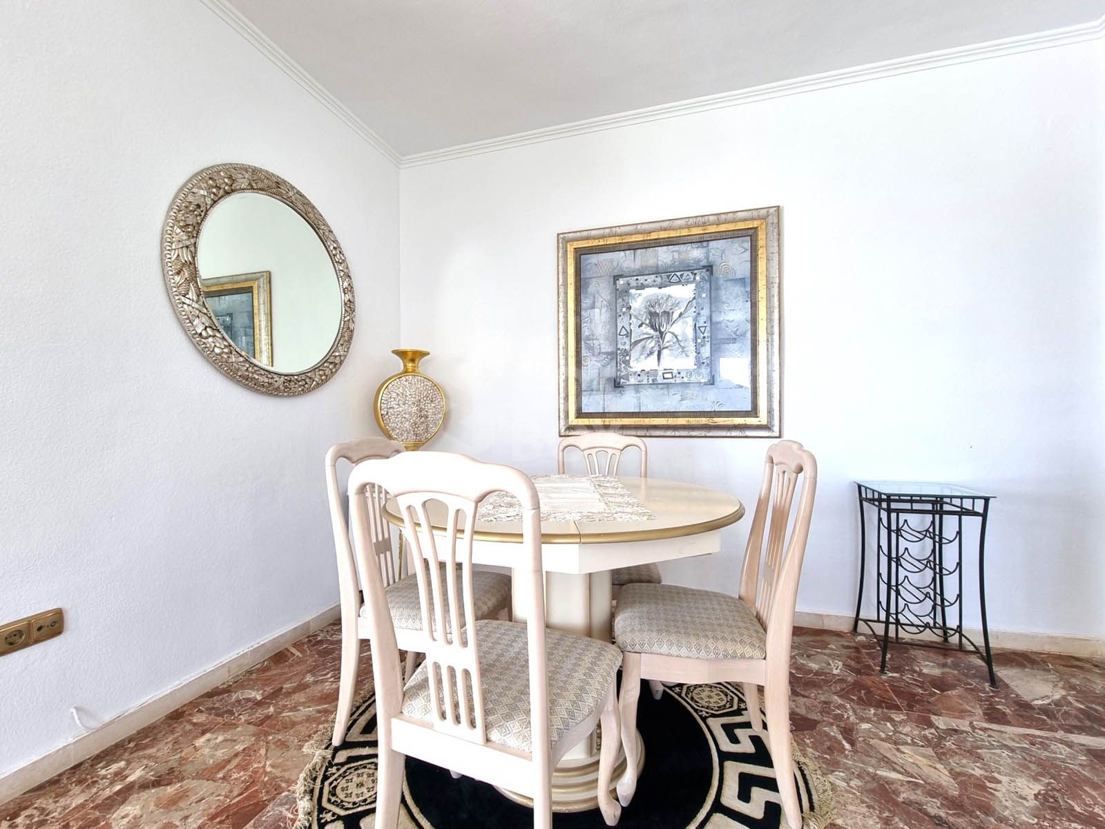 This exclusive 4th-floor apartment is a true coastal sanctuary, offering uninterrupted sea views and direct access to pristine beaches and lush communal gardens.