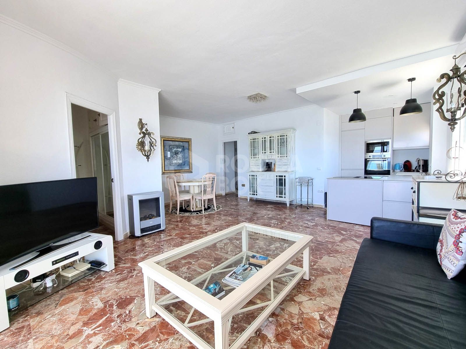 This exclusive 4th-floor apartment is a true coastal sanctuary, offering uninterrupted sea views and direct access to pristine beaches and lush communal gardens.