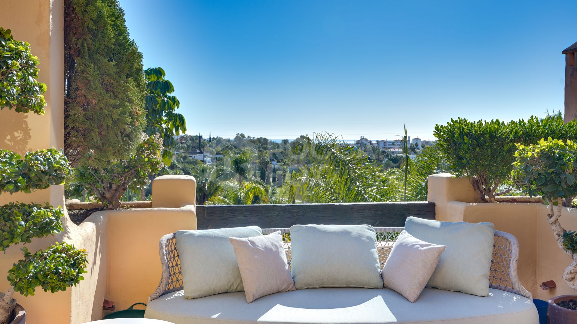 Mediterranean-style duplex penthouse with multiple terraces and a rooftop terrace with a private sauna and barbecue area