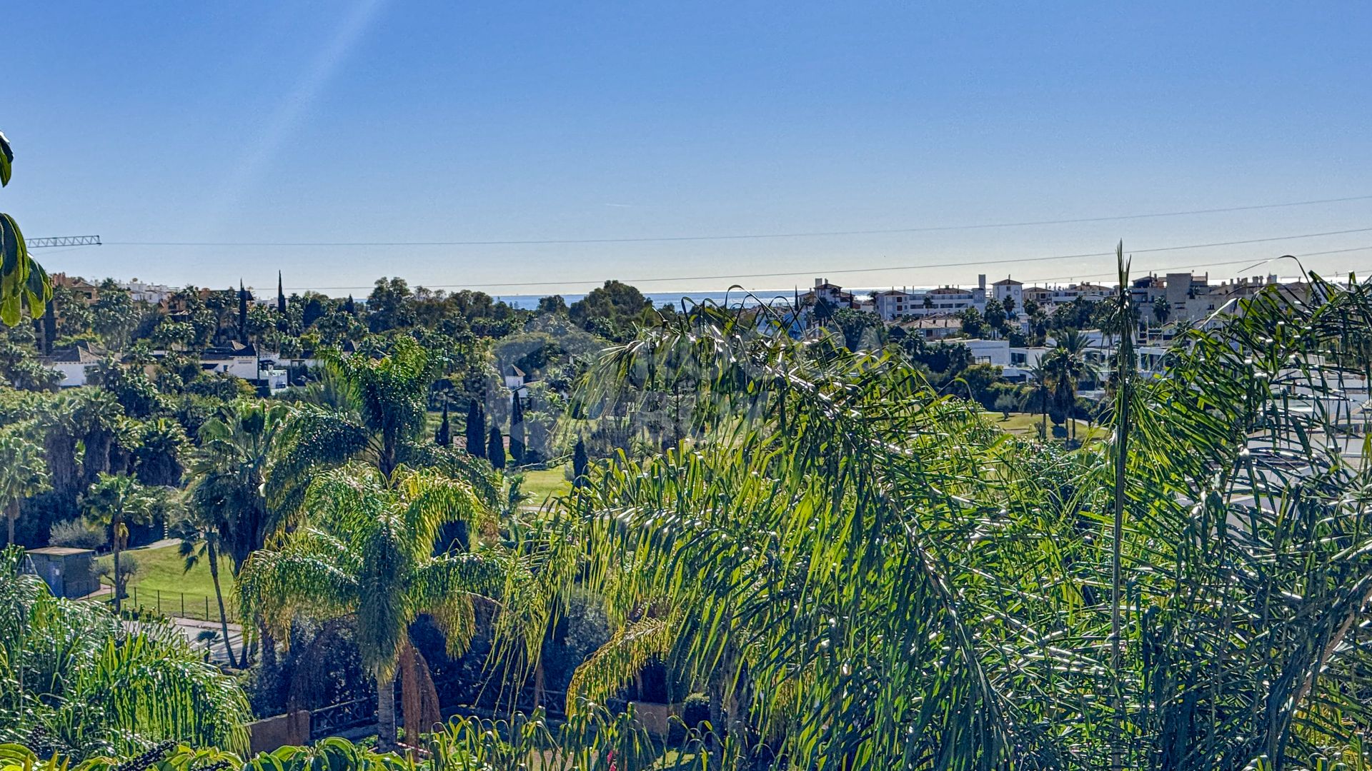 Mediterranean-style duplex penthouse with multiple terraces and a rooftop terrace with a private sauna and barbecue area