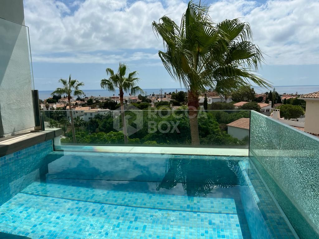 Welcome to this exquisite, almost brand-new apartment perched in the scenic Santa Barbara Heights.