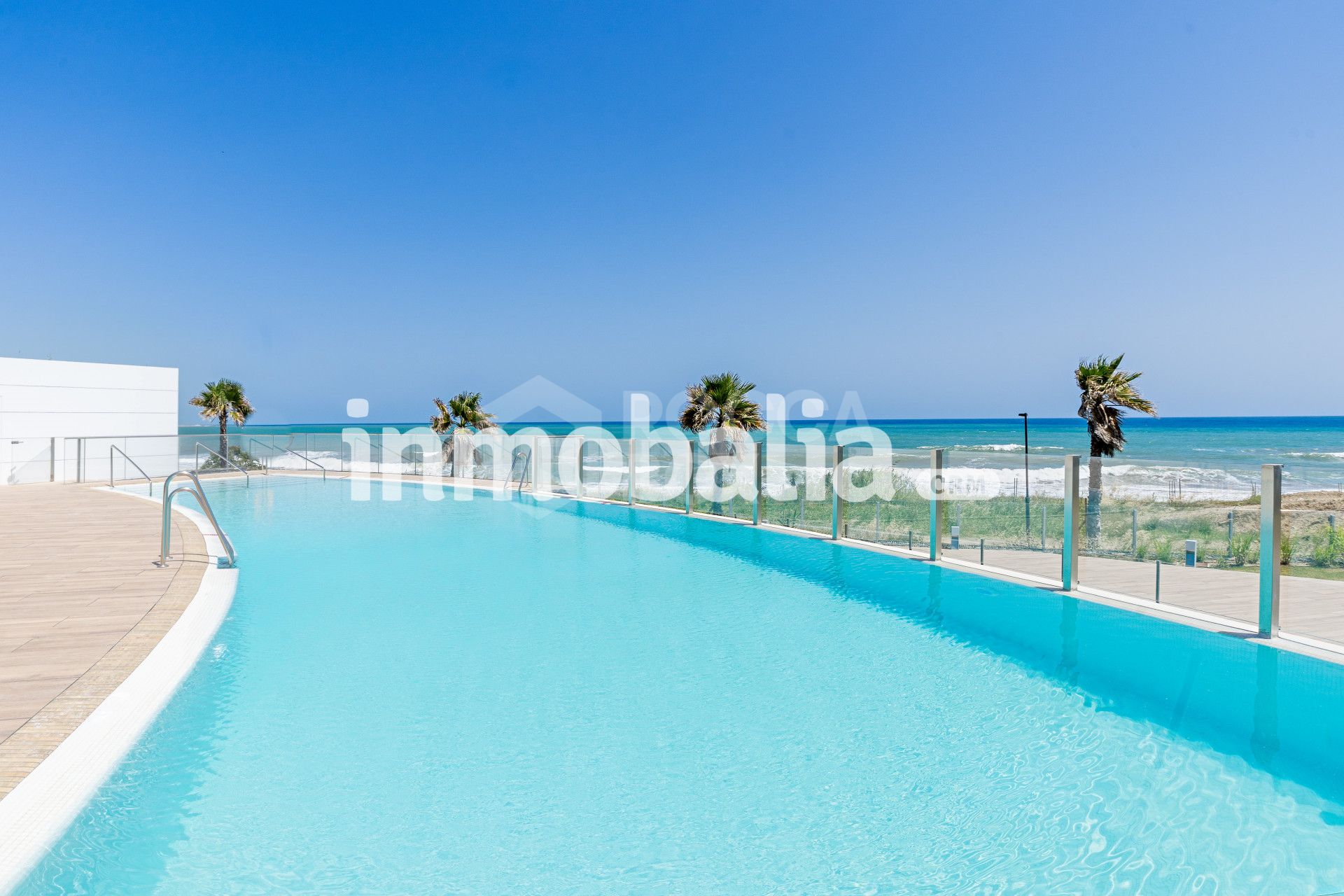 Luxurious beachfront apartment with private garden