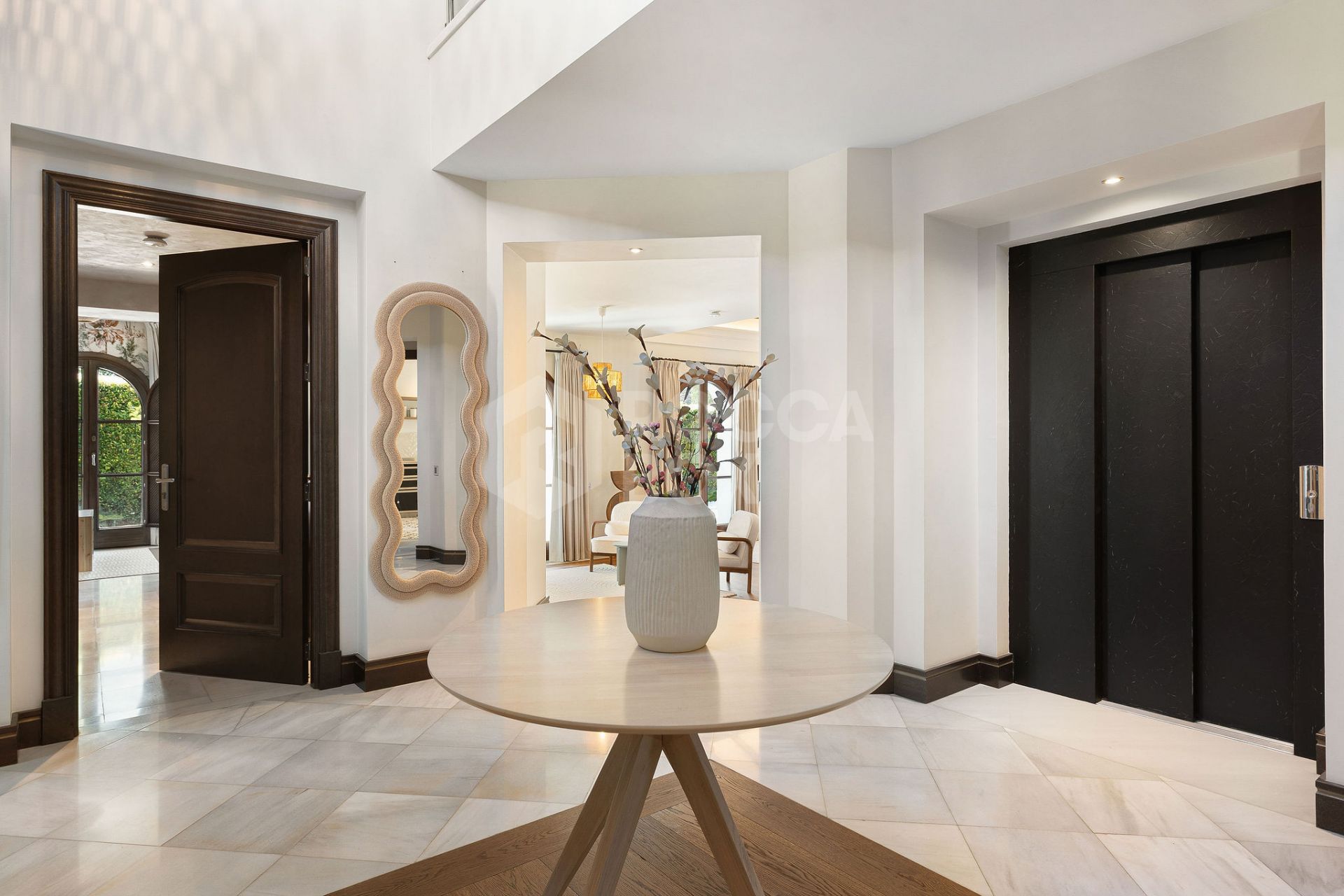 Welcome to this exclusive three-level villa in San Pedro Playa