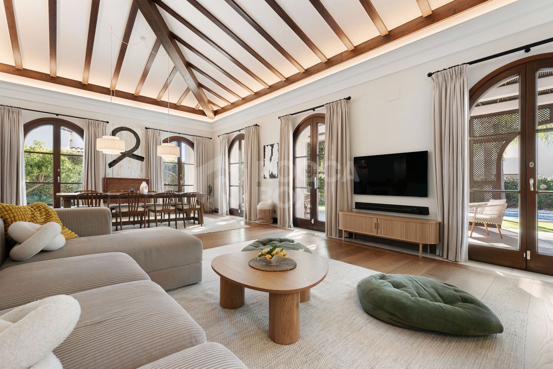 Welcome to this exclusive three-level villa in San Pedro Playa