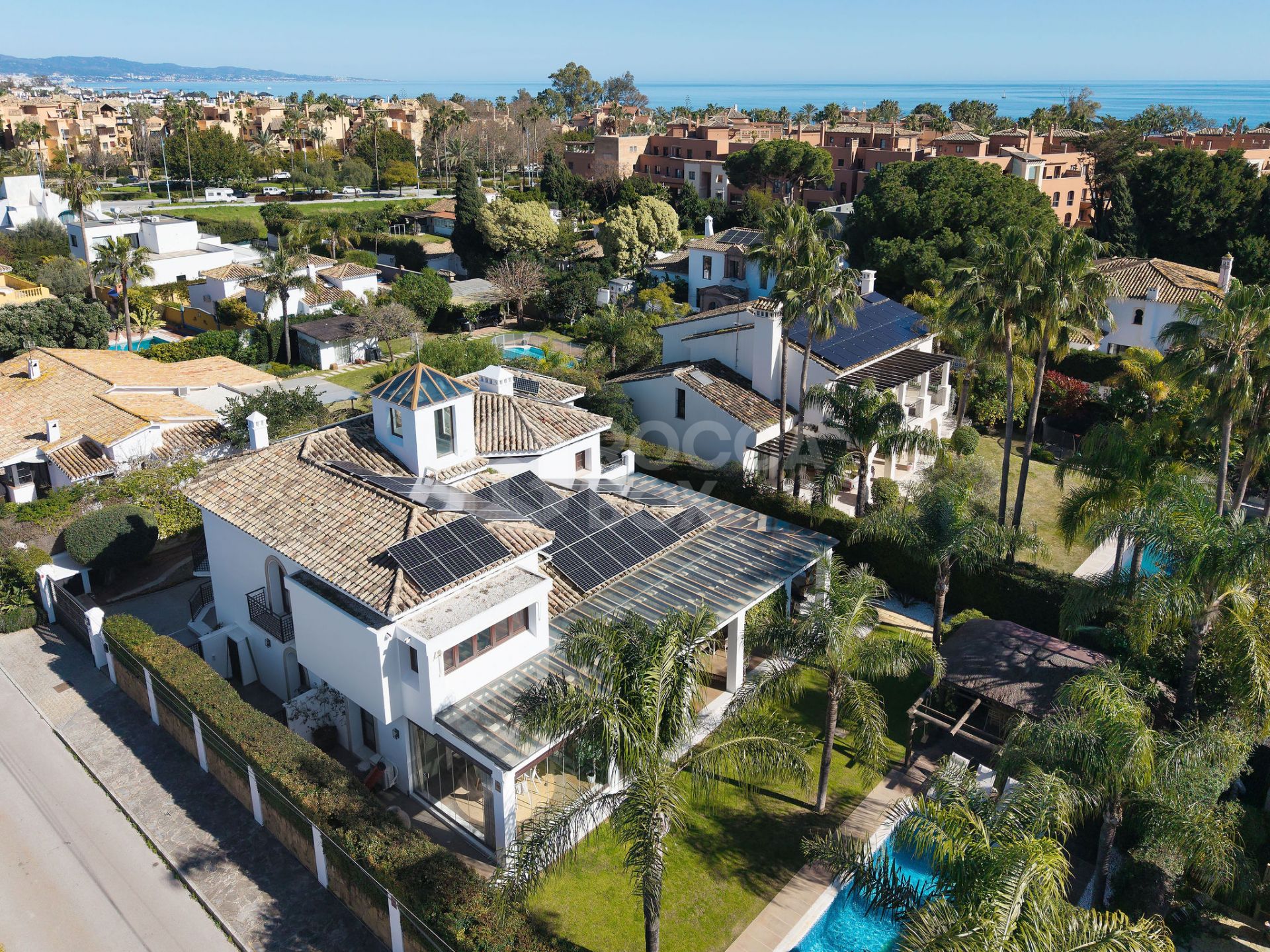 Welcome to this exclusive three-level villa in San Pedro Playa