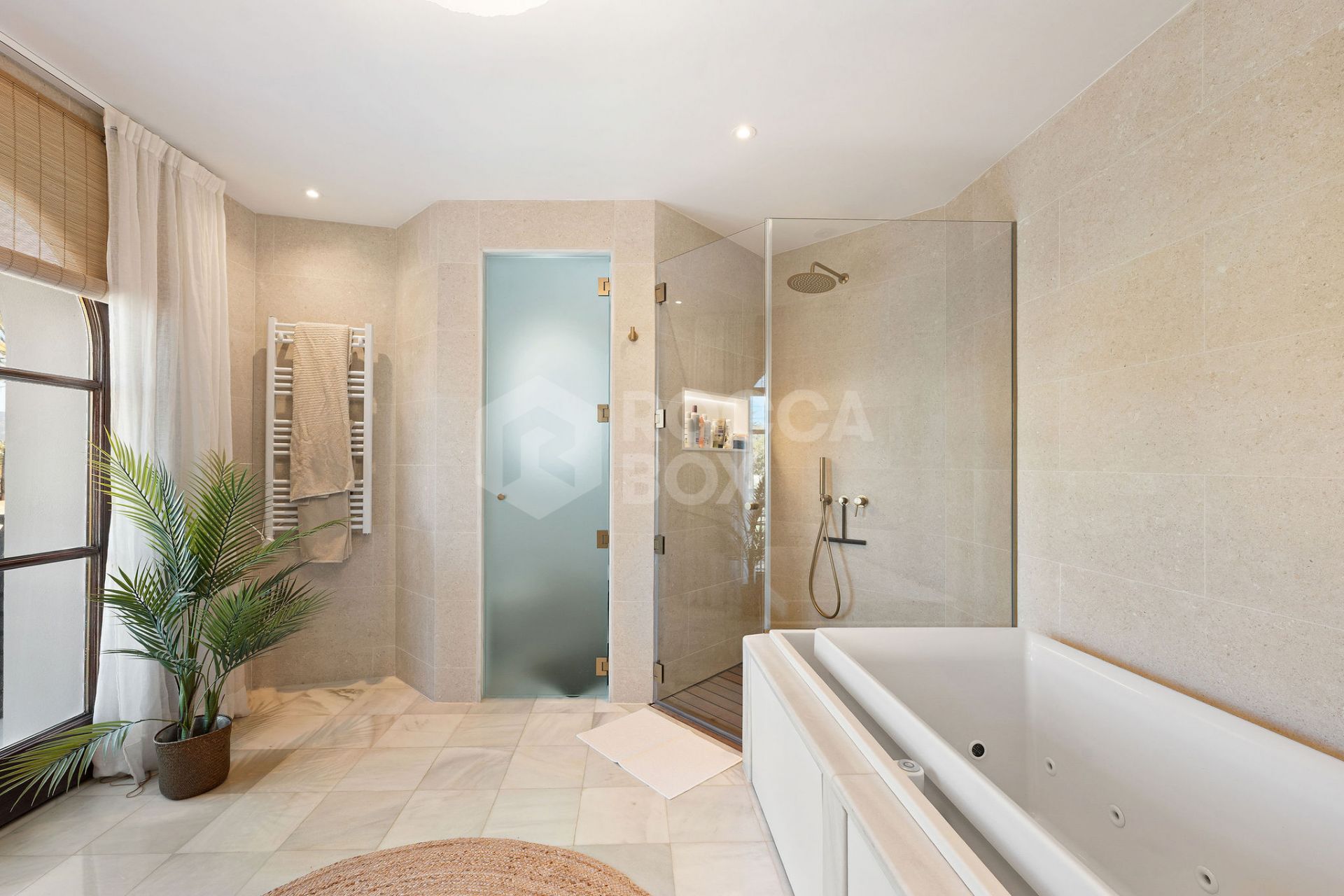 Welcome to this exclusive three-level villa in San Pedro Playa