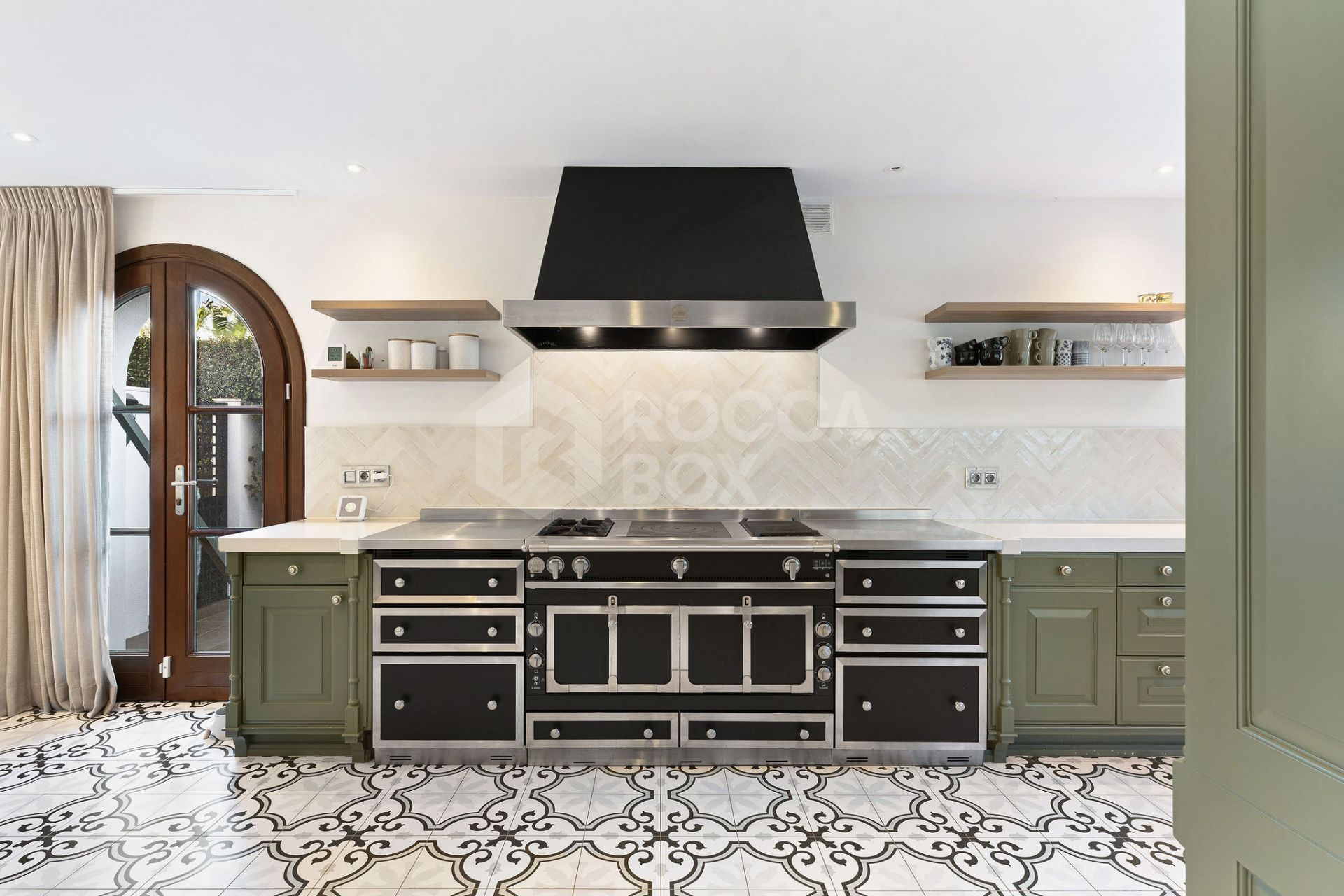 Welcome to this exclusive three-level villa in San Pedro Playa