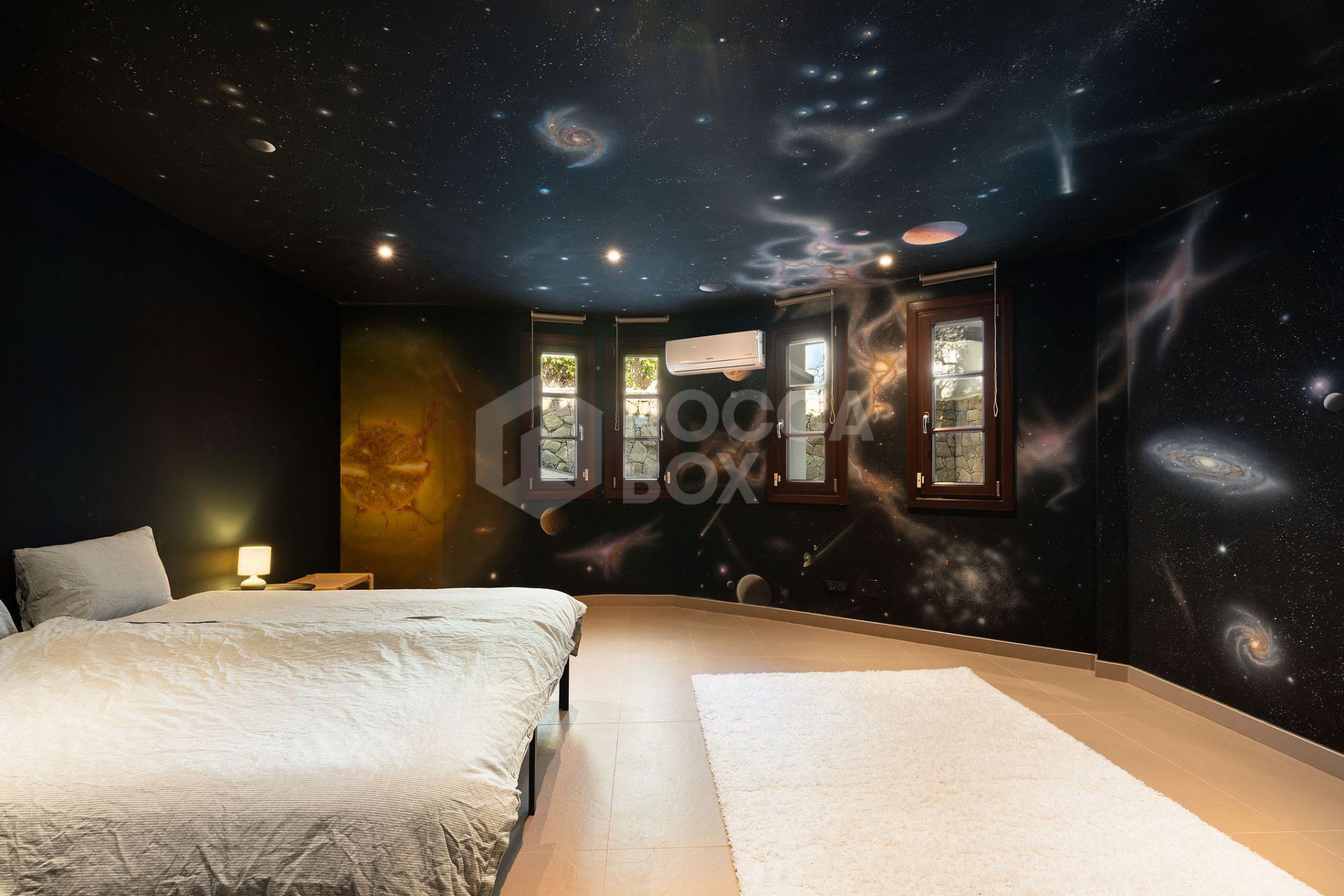 Welcome to this exclusive three-level villa in San Pedro Playa