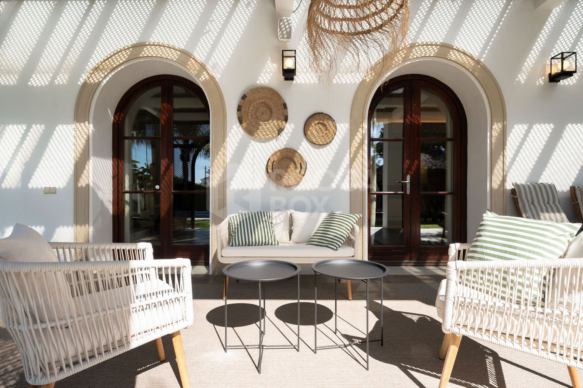 Welcome to this exclusive three-level villa in San Pedro Playa