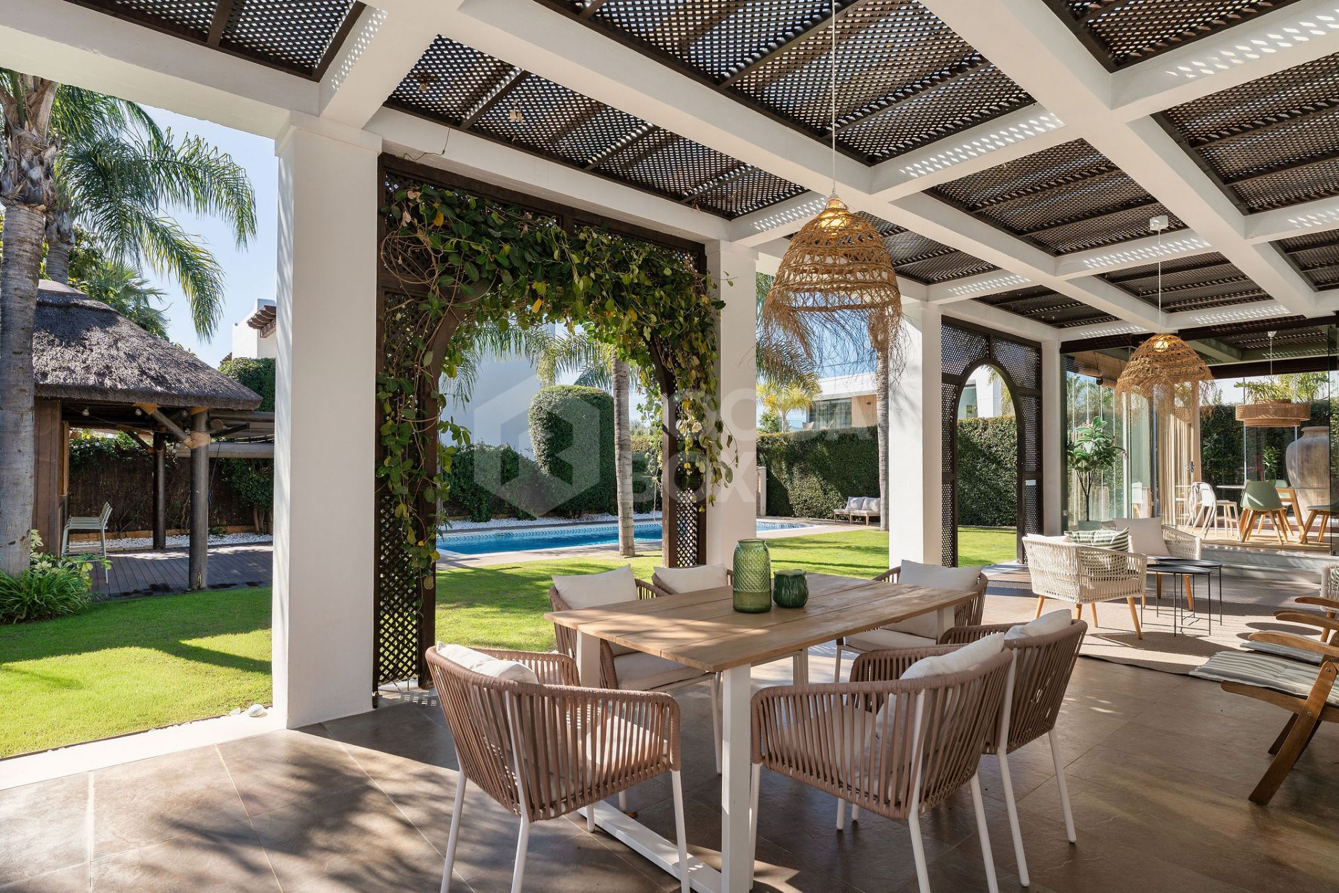 Welcome to this exclusive three-level villa in San Pedro Playa