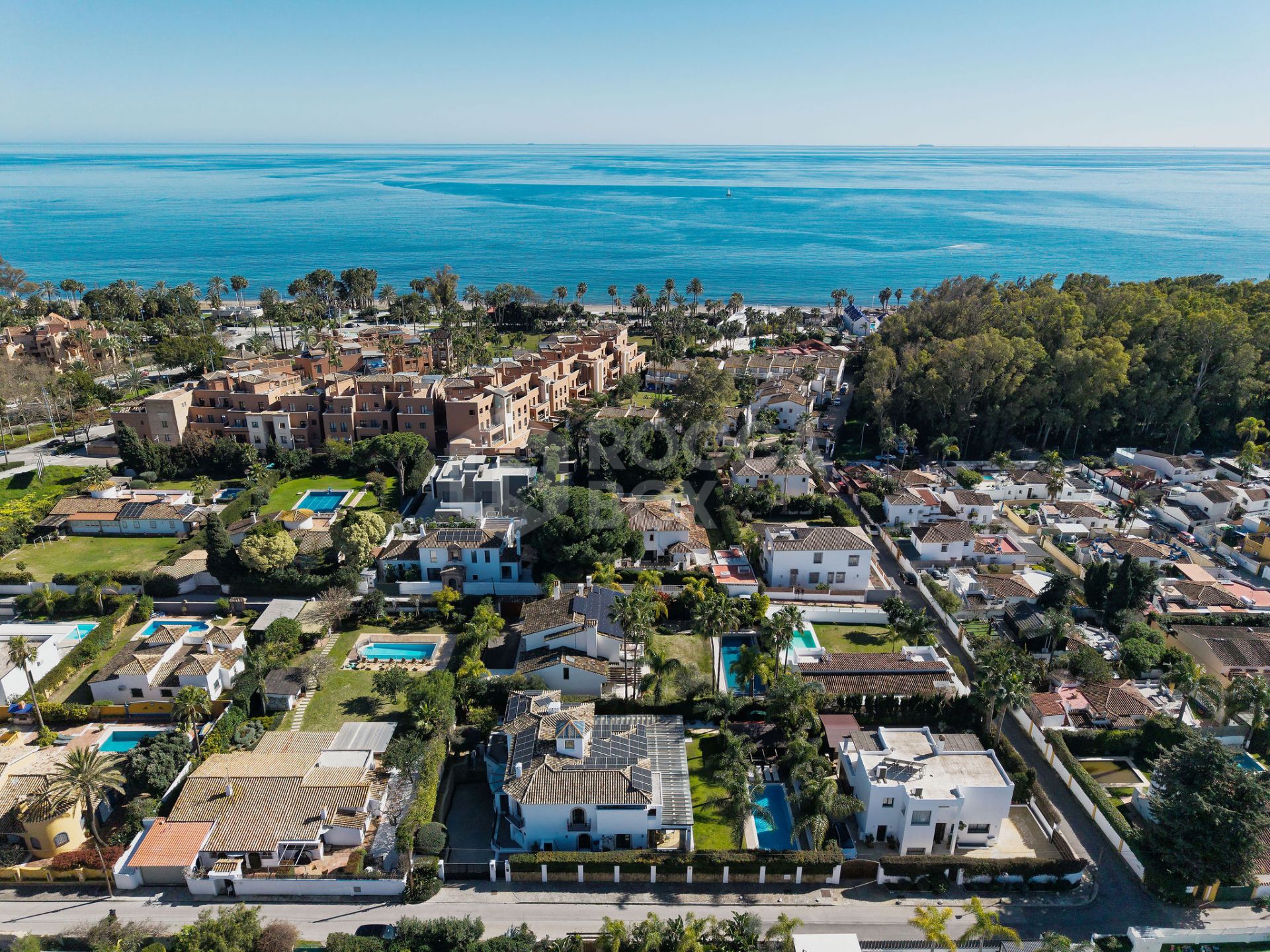 Welcome to this exclusive three-level villa in San Pedro Playa