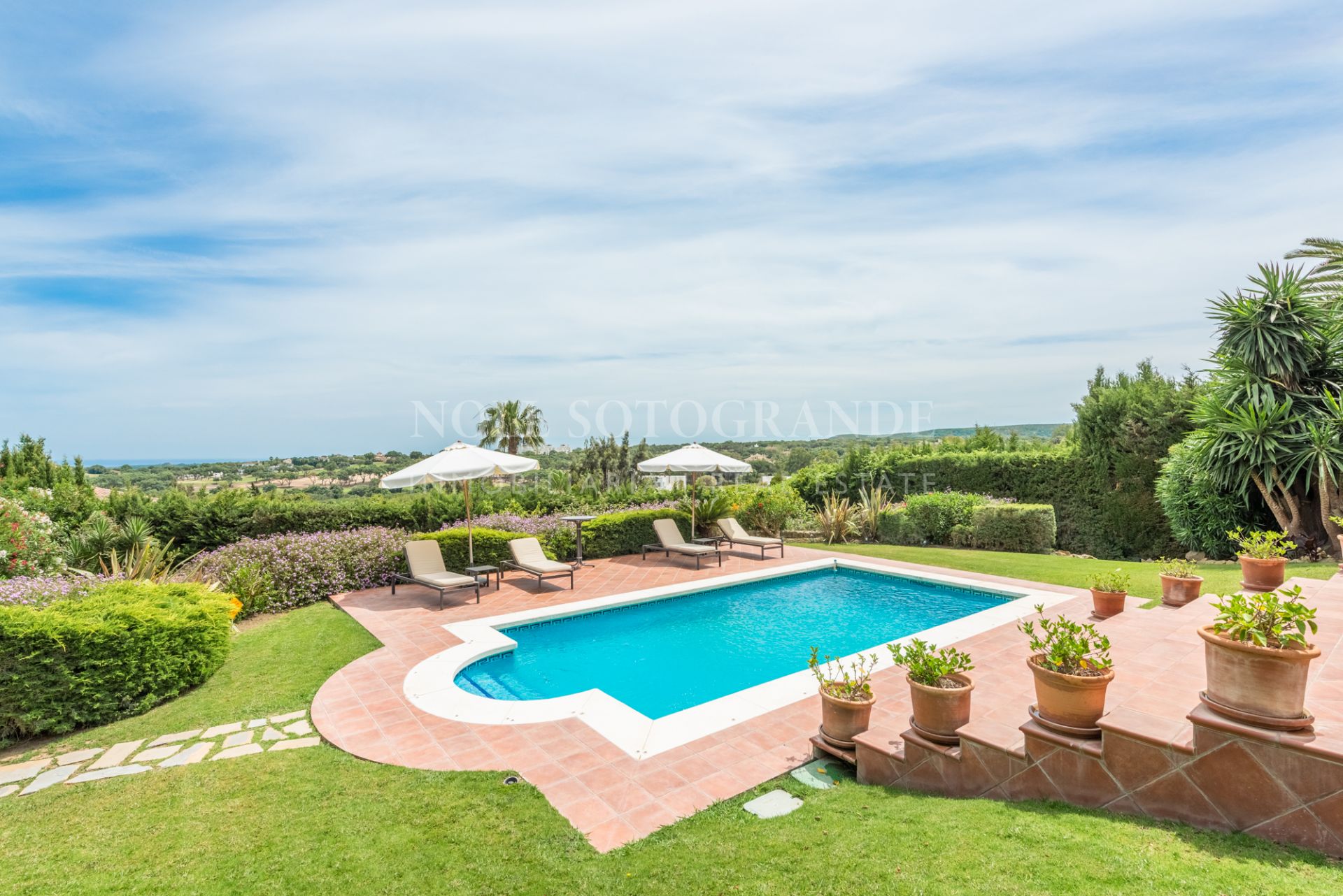 Wonderful family holiday villa for sale in Sotogrande Alto enjoying southerly sea views over the San Roque Golf Club