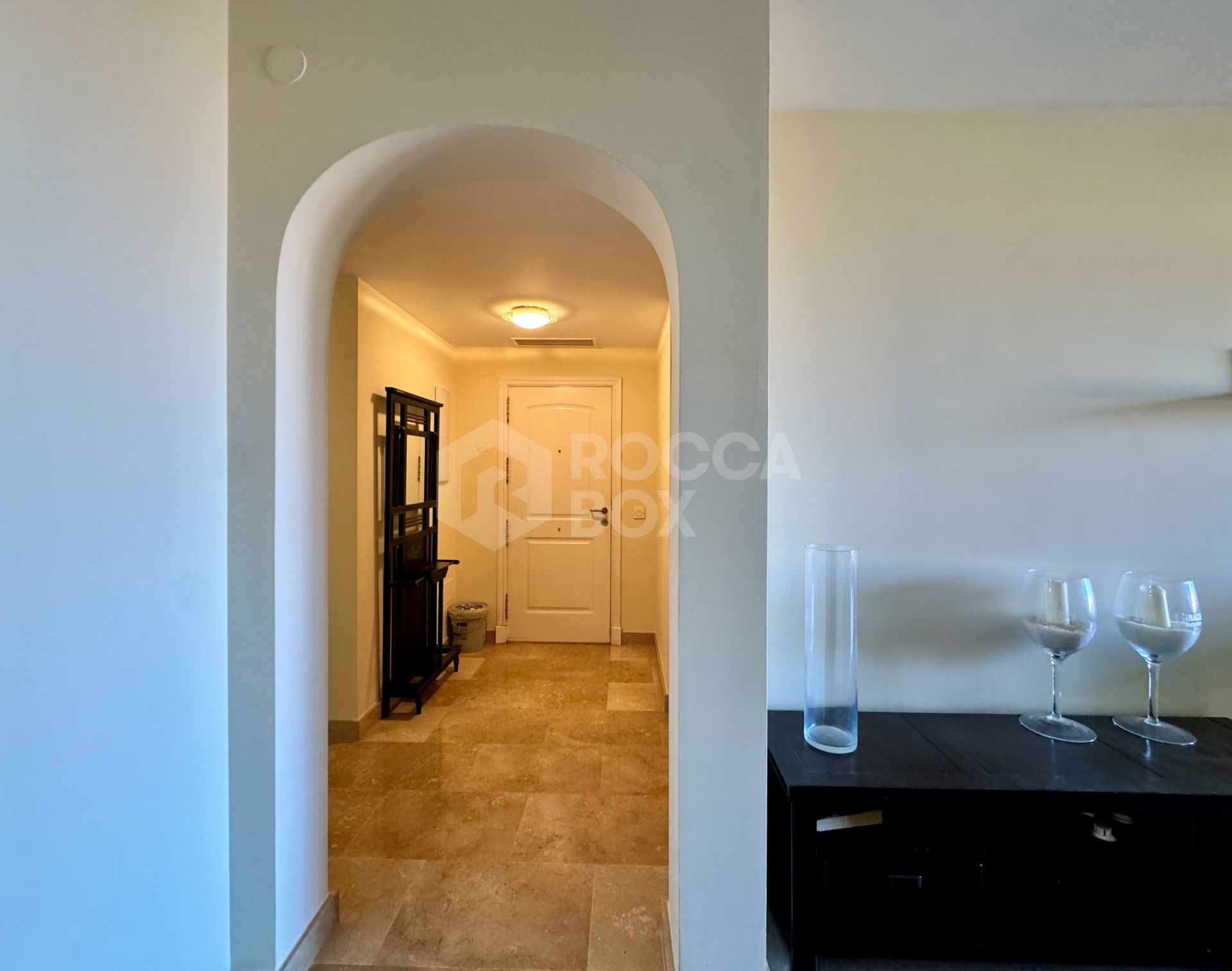 Elevated ground-floor apartment with terrace and open outlook, Manilva