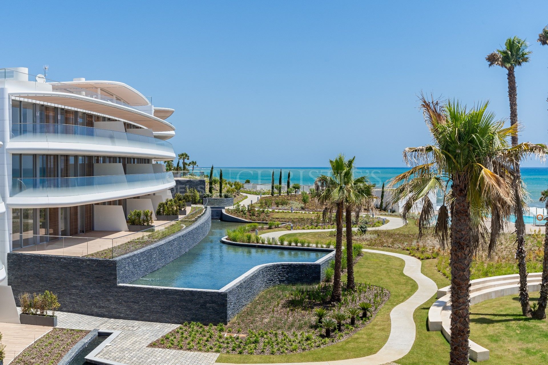 Impressive frontline beach apartment in ground floor, Estepona | Christie’s International Real Estate