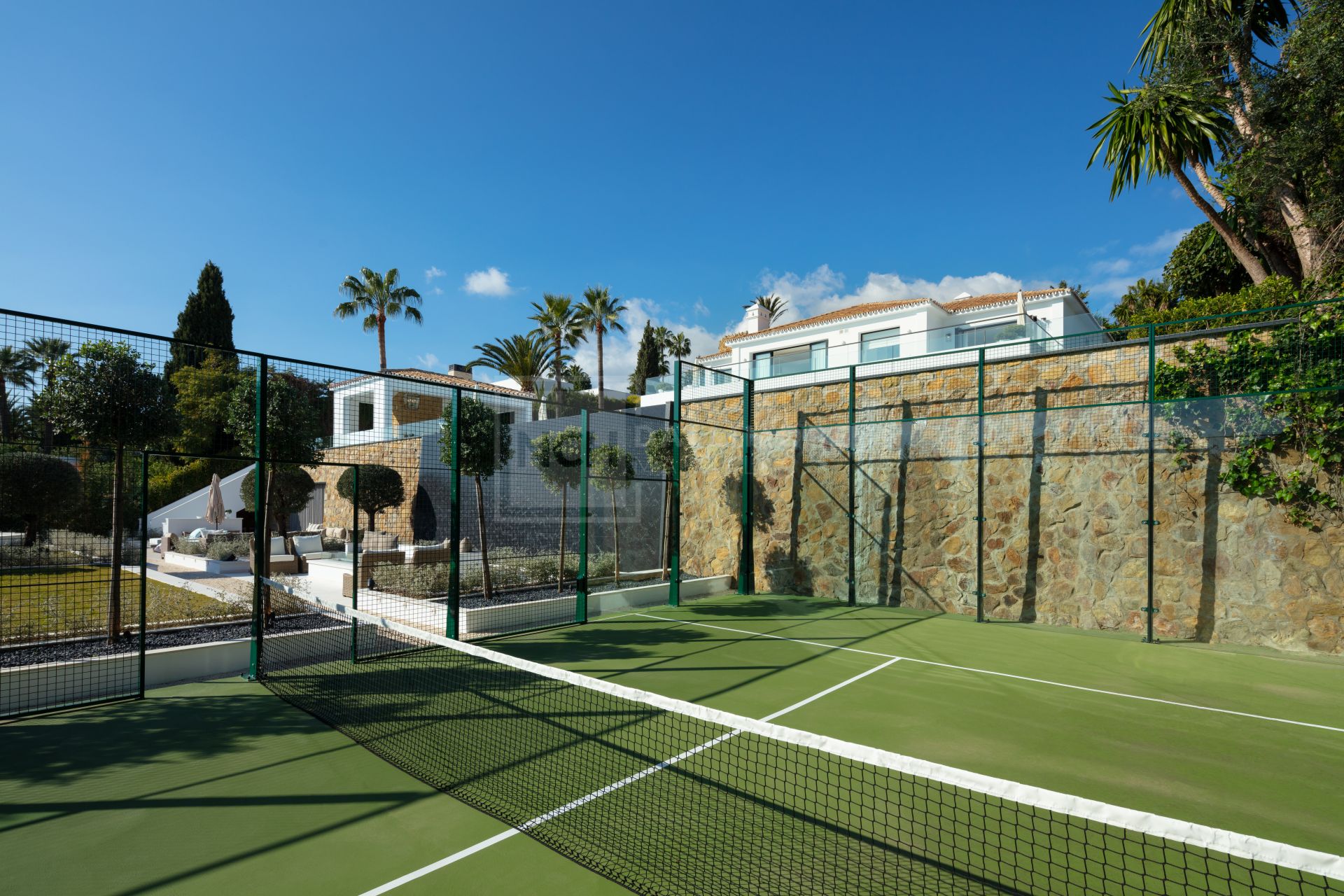 VILLA WITH PRIVATE TENNIS COURT LOCATED IN GATED COMMUNITY