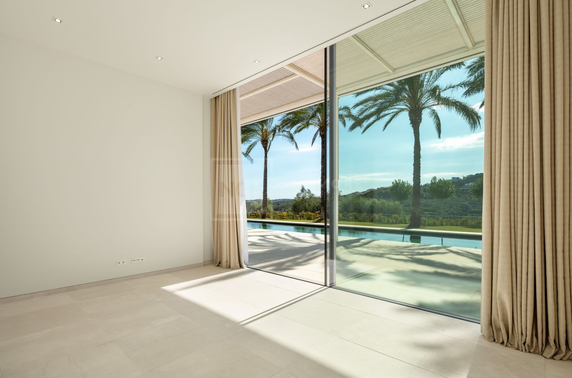MODERN FRONT-LINE GOLF VILLA LOCATED WITHING THE FINCA CORTESIN RESORT