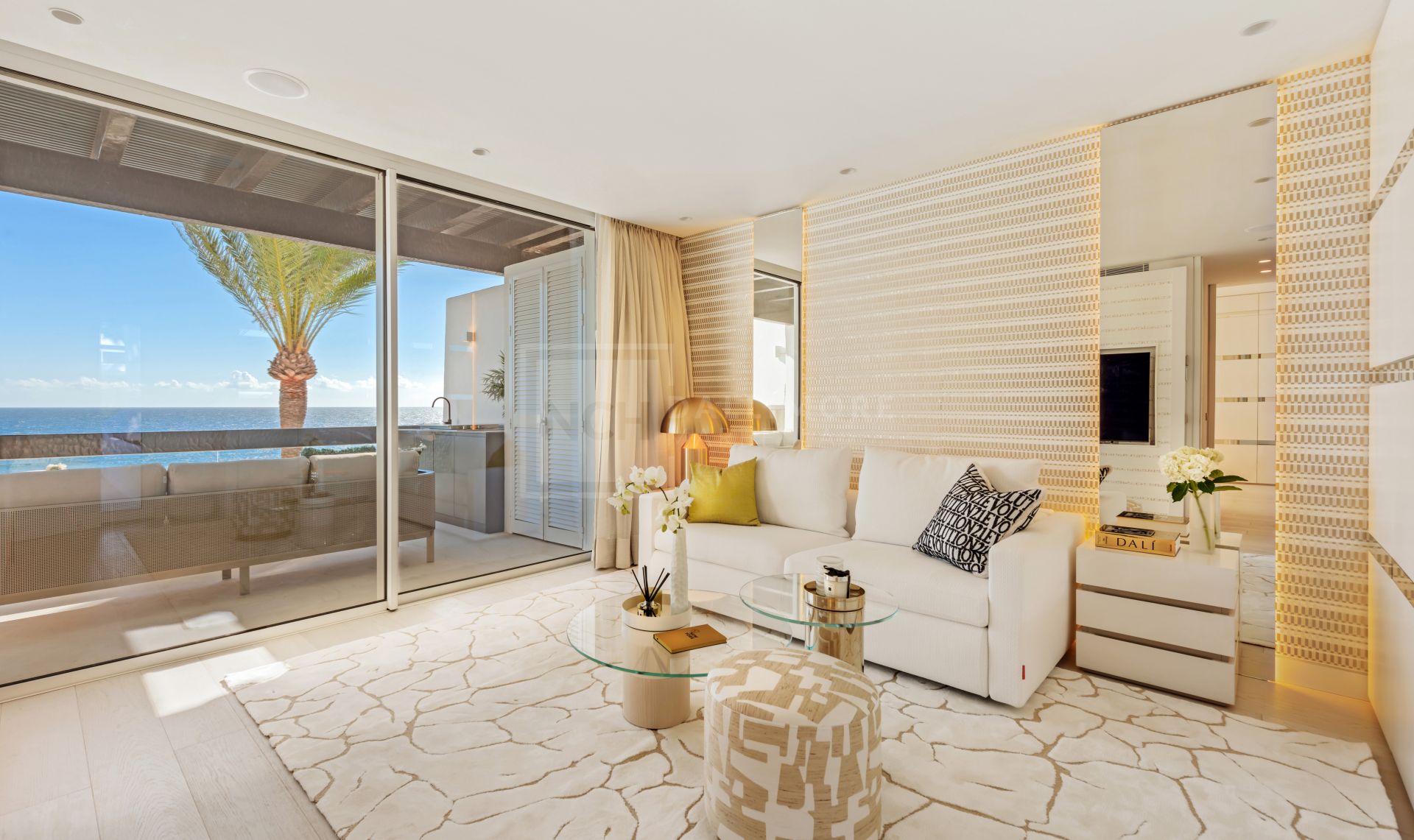 LUXURY BEACHFRONT LIVING ON MARBELLA'S GOLDEN MILE: EXCLUSIVE DUPLEX PENTHOUSE WITH PANORAMIC SEA VIEWS AND PREMIUM AMENITIES