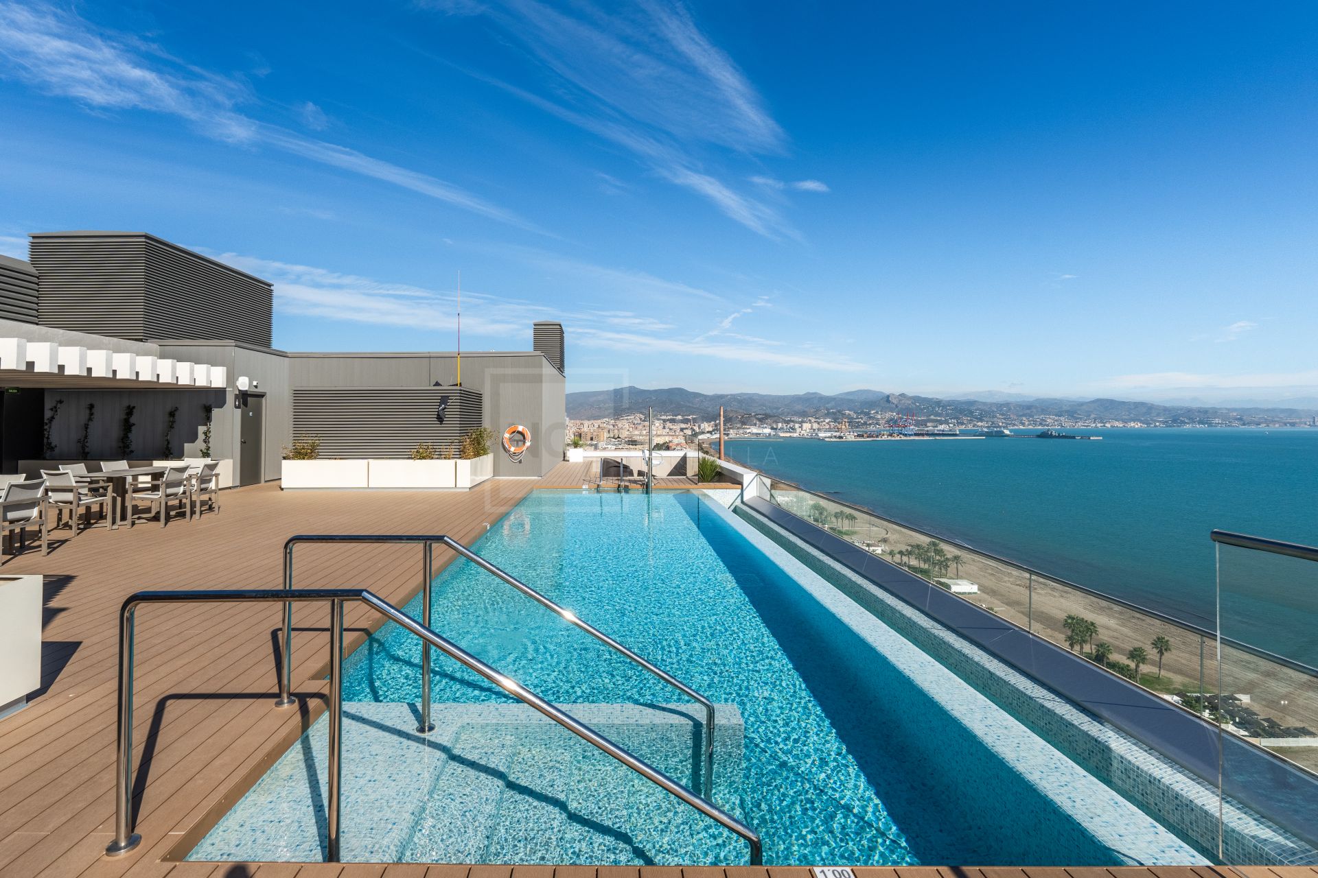 BEACHFRONT 4-BEDROOM APARTMENT WITH TERRACE, SPA, POOLS, AND CO-WORKING AREA