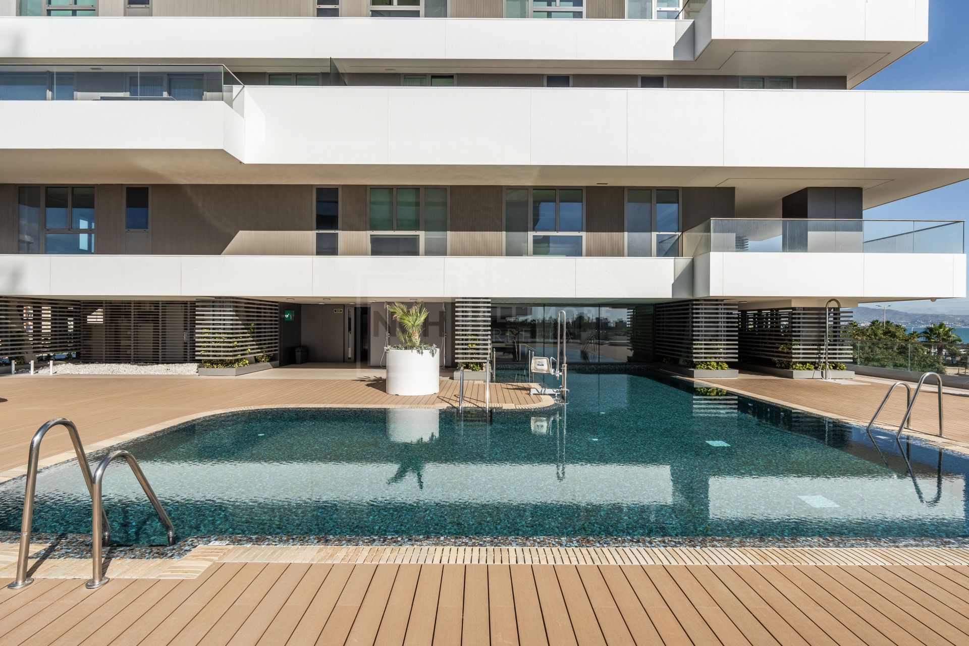 BEACHFRONT 4-BEDROOM APARTMENT WITH TERRACE, SPA, POOLS, AND CO-WORKING AREA