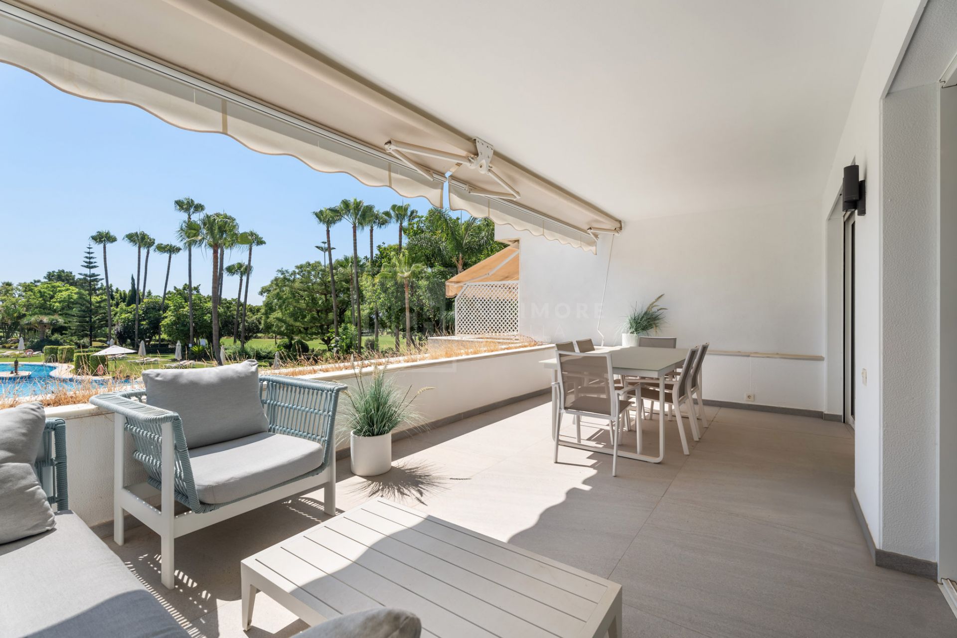 ELEGANT 2-BEDROOM RETREAT IN NUEVA ANDALUCÍA WITH POOLS, GYM AND GOLF VIEWS